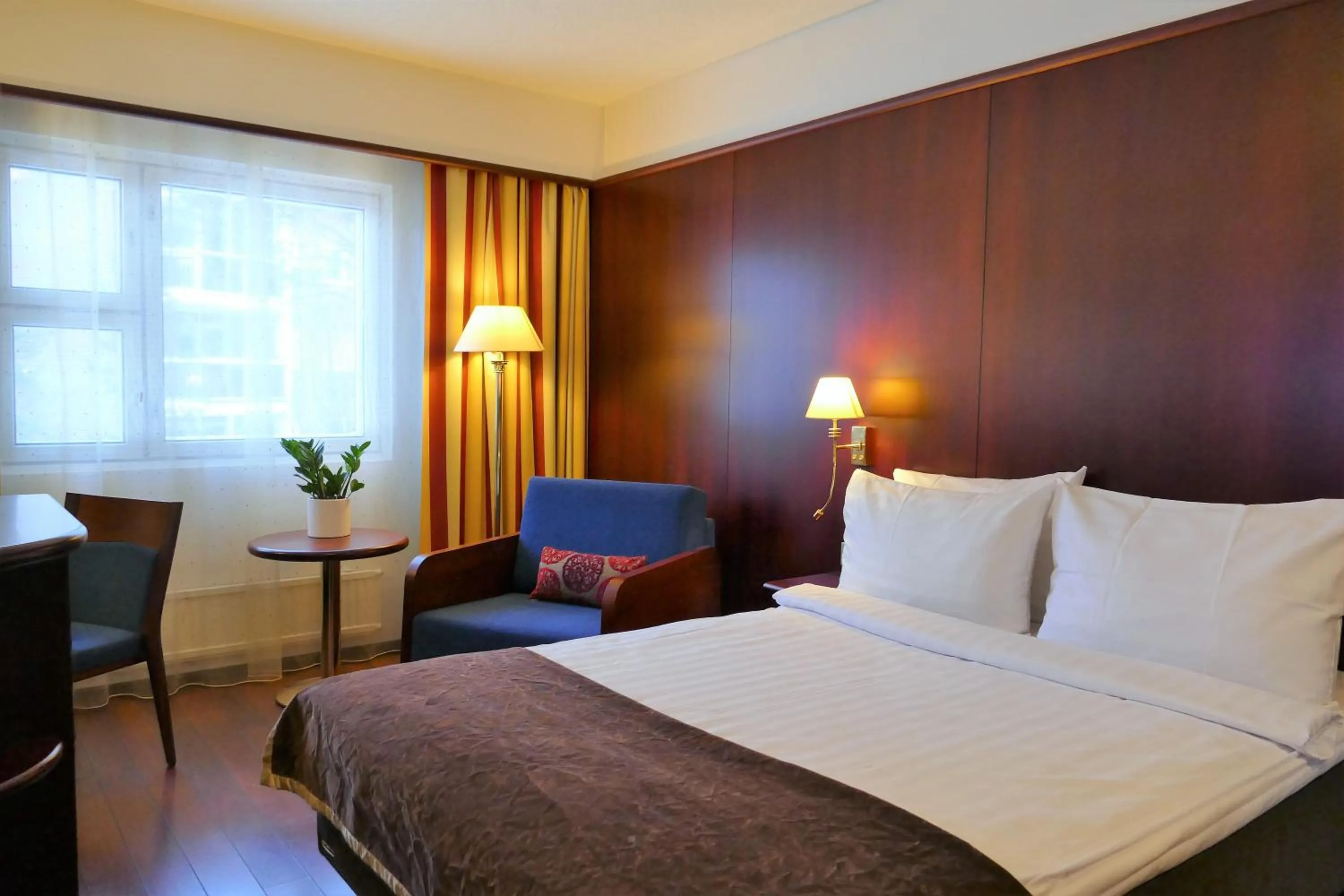 Bed in Hotel Kalliohovi