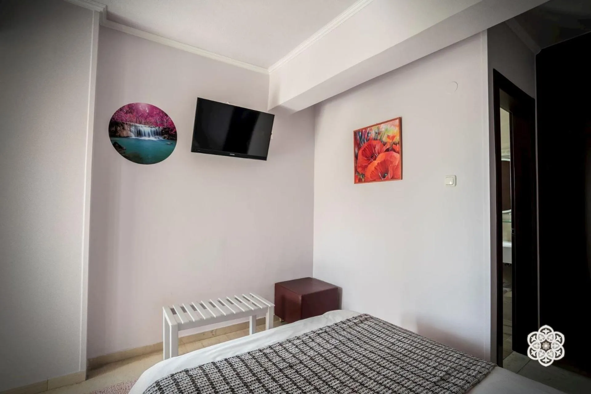 Bed in Aktaion Hotel