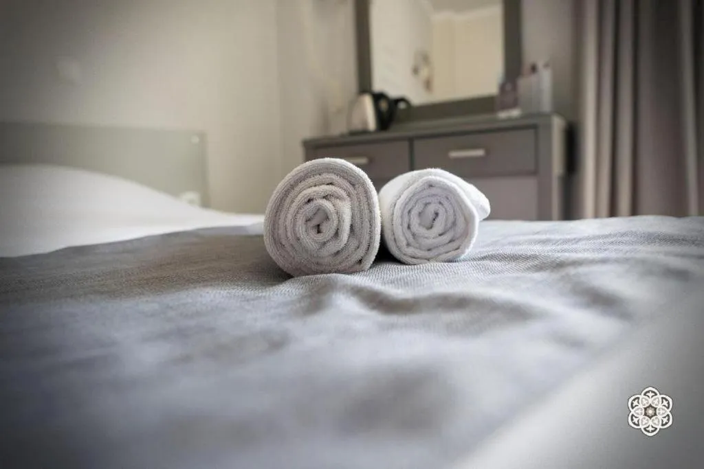 Bed in Aktaion Hotel