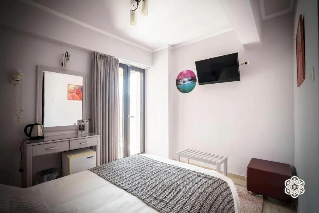 Bed in Aktaion Hotel