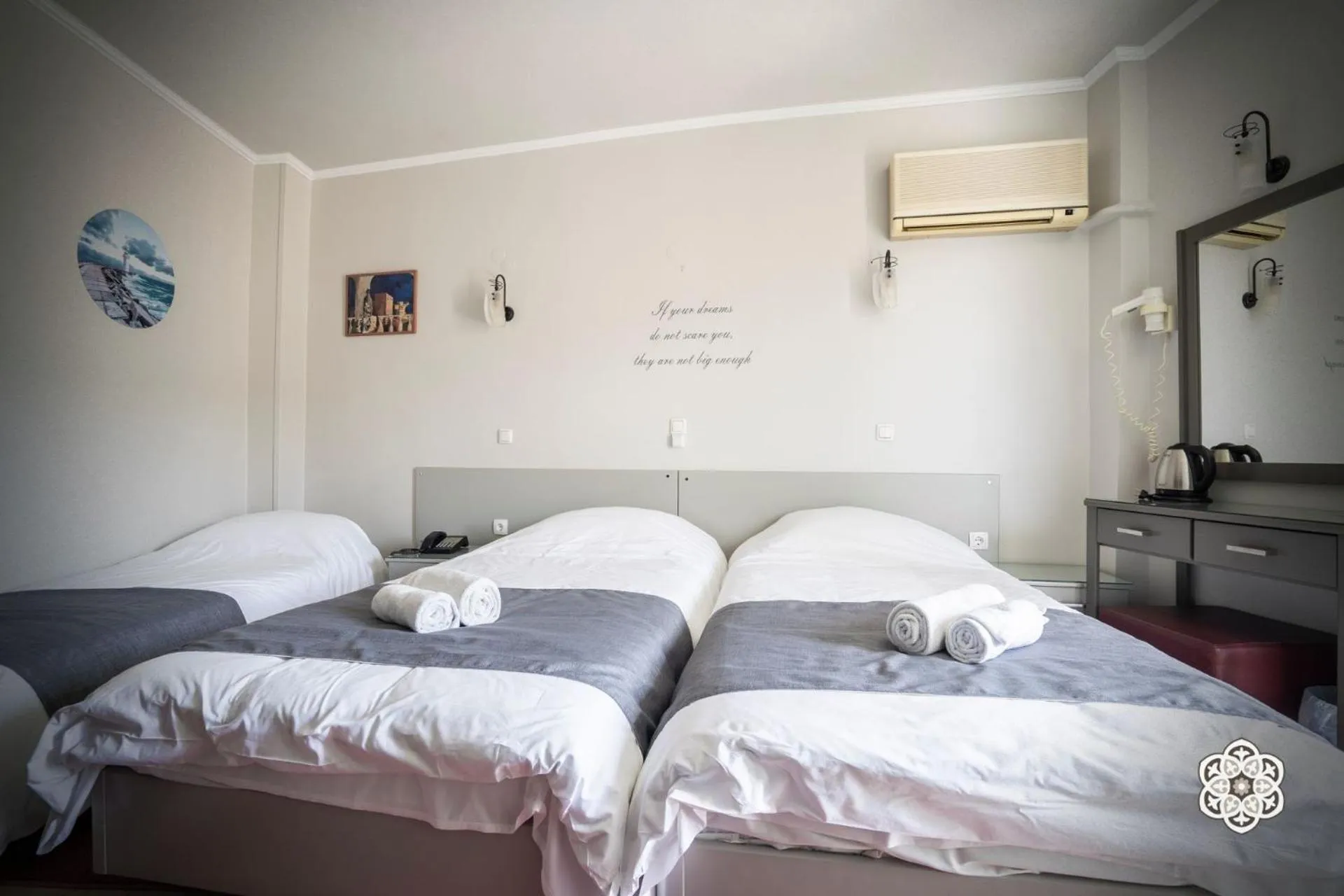 Bed in Aktaion Hotel