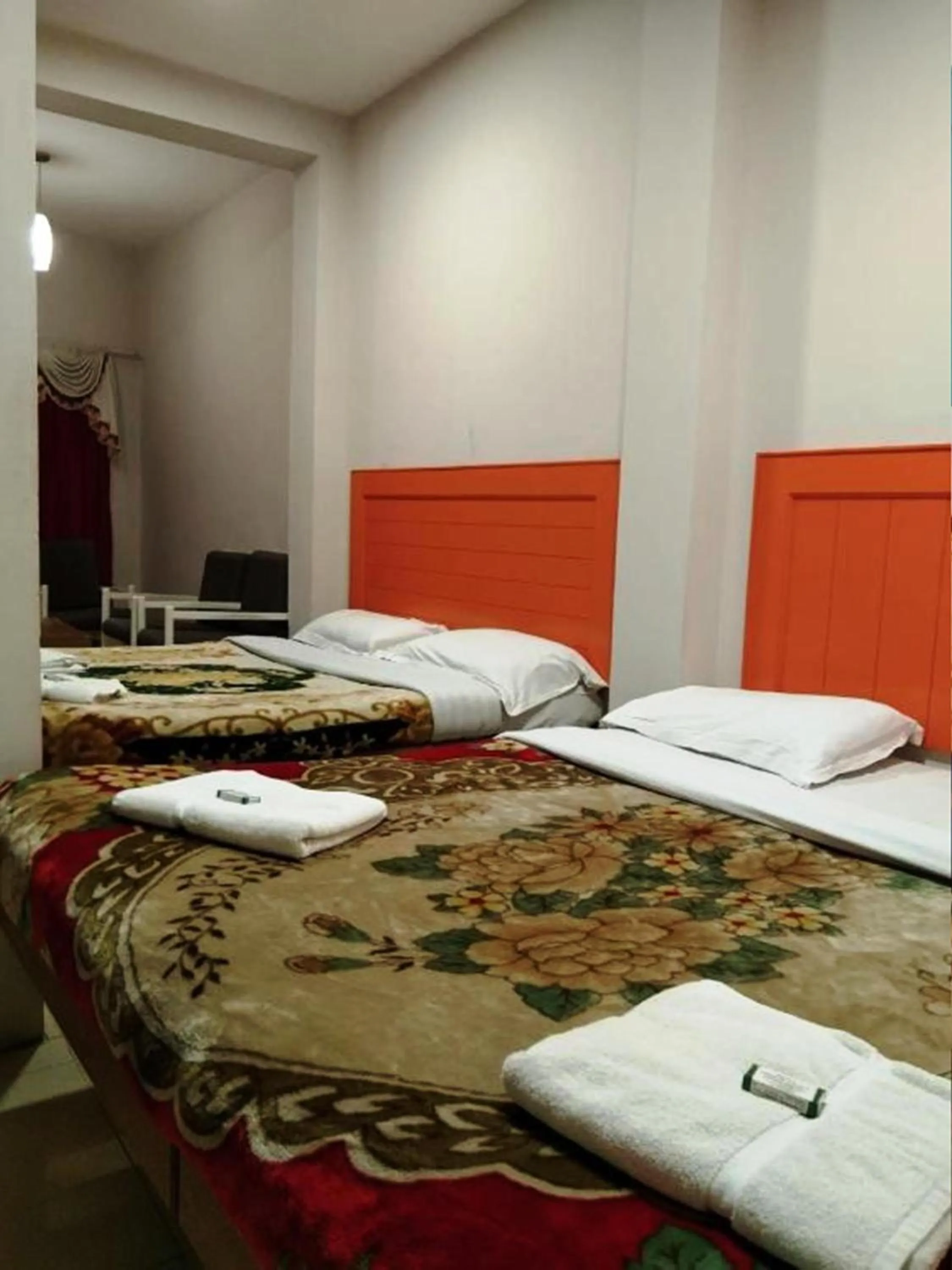 Bed in Hotel Preethi Palace