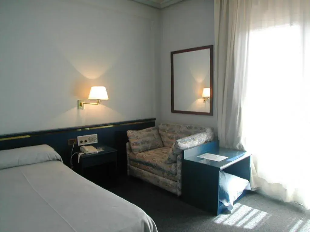 Bed in Hotel Rey Sancho Ramírez Somontano SL Bed in Hotel Rey Sancho Ramírez Somontano SL