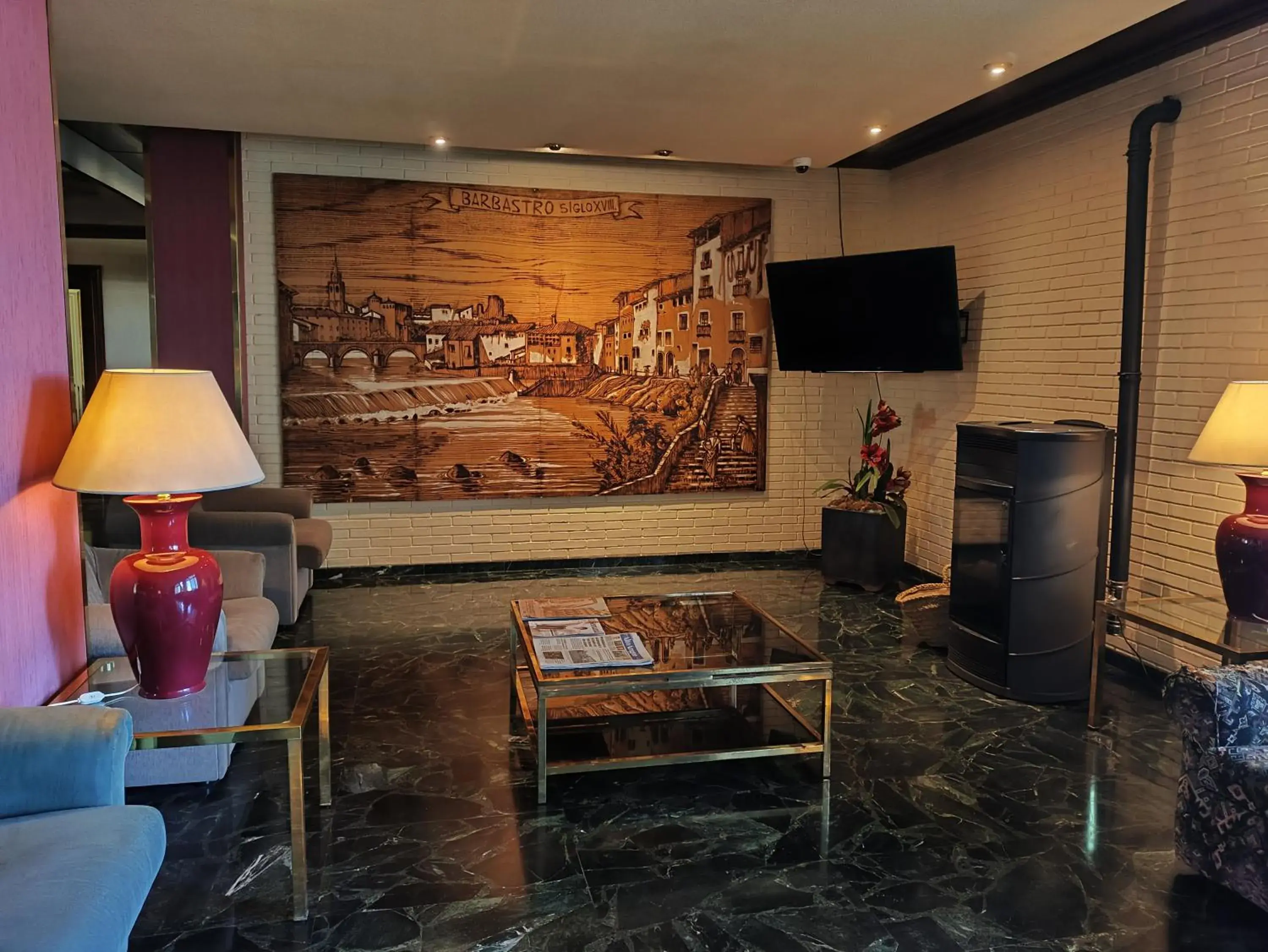 Lobby or reception in Hotel Rey Sancho Ramírez Somontano SL Lobby or reception in Hotel Rey Sancho Ramírez Somontano SL