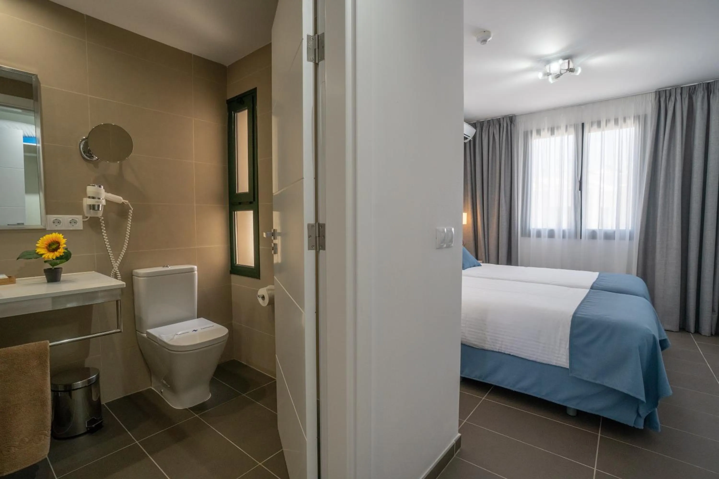 Bathroom, Bed in Bitacora Lanzarote Club