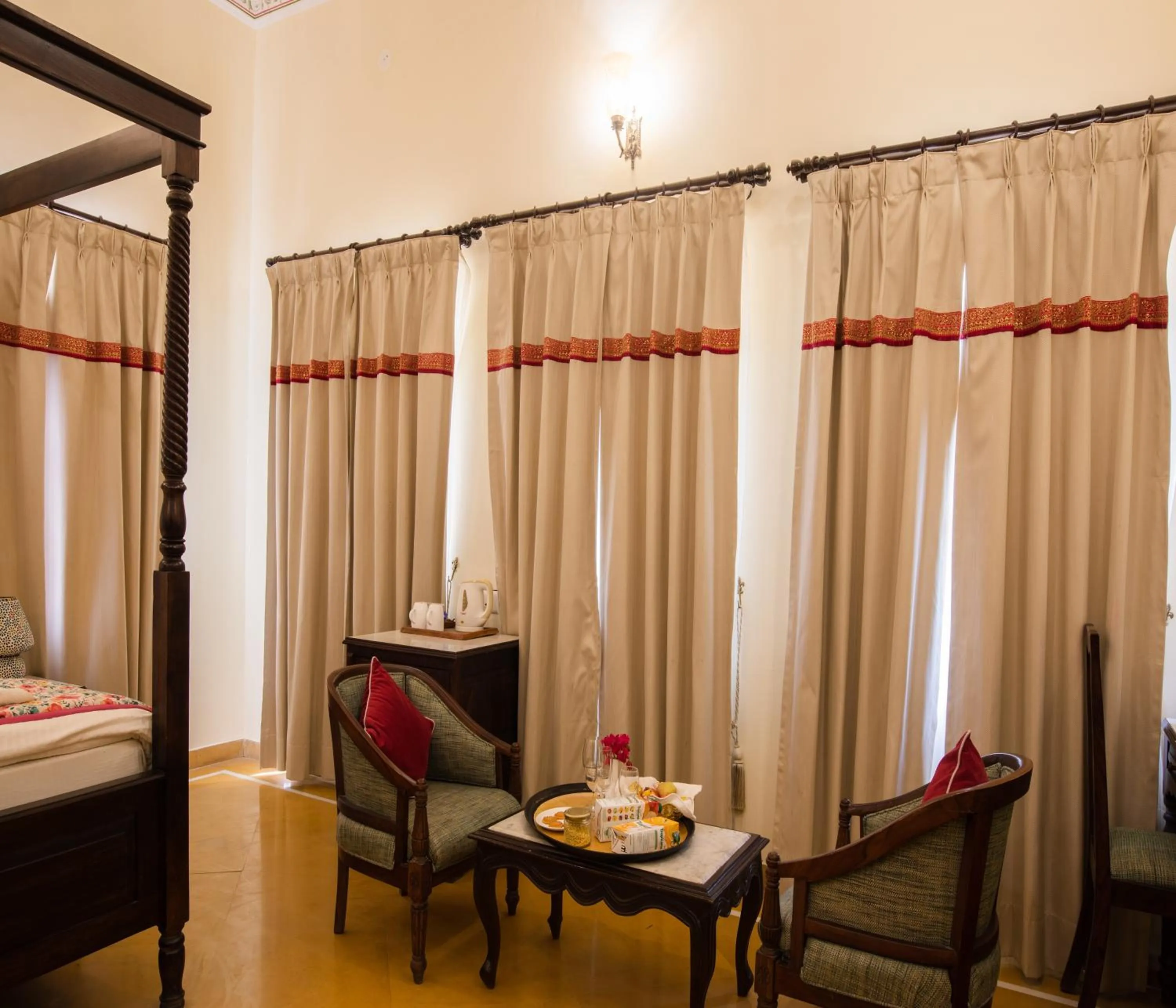 Seating area, Bed in SKK The Fern An Ecotel Hotel, Jaisalmer