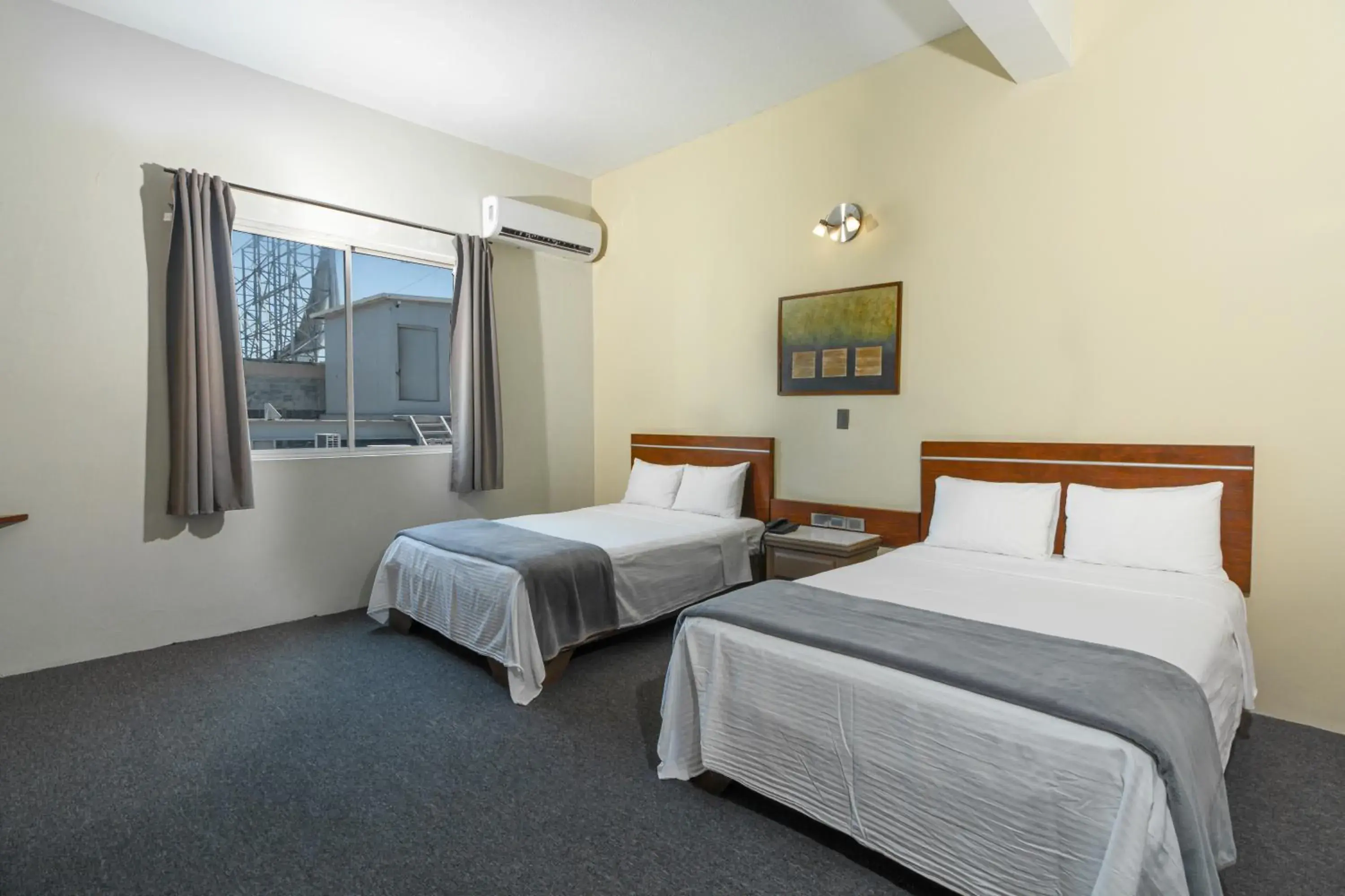 Bedroom, Bed in Hotel Plaza del Arco - Monterrey Bedroom, Bed in Hotel Plaza del Arco - Monterrey