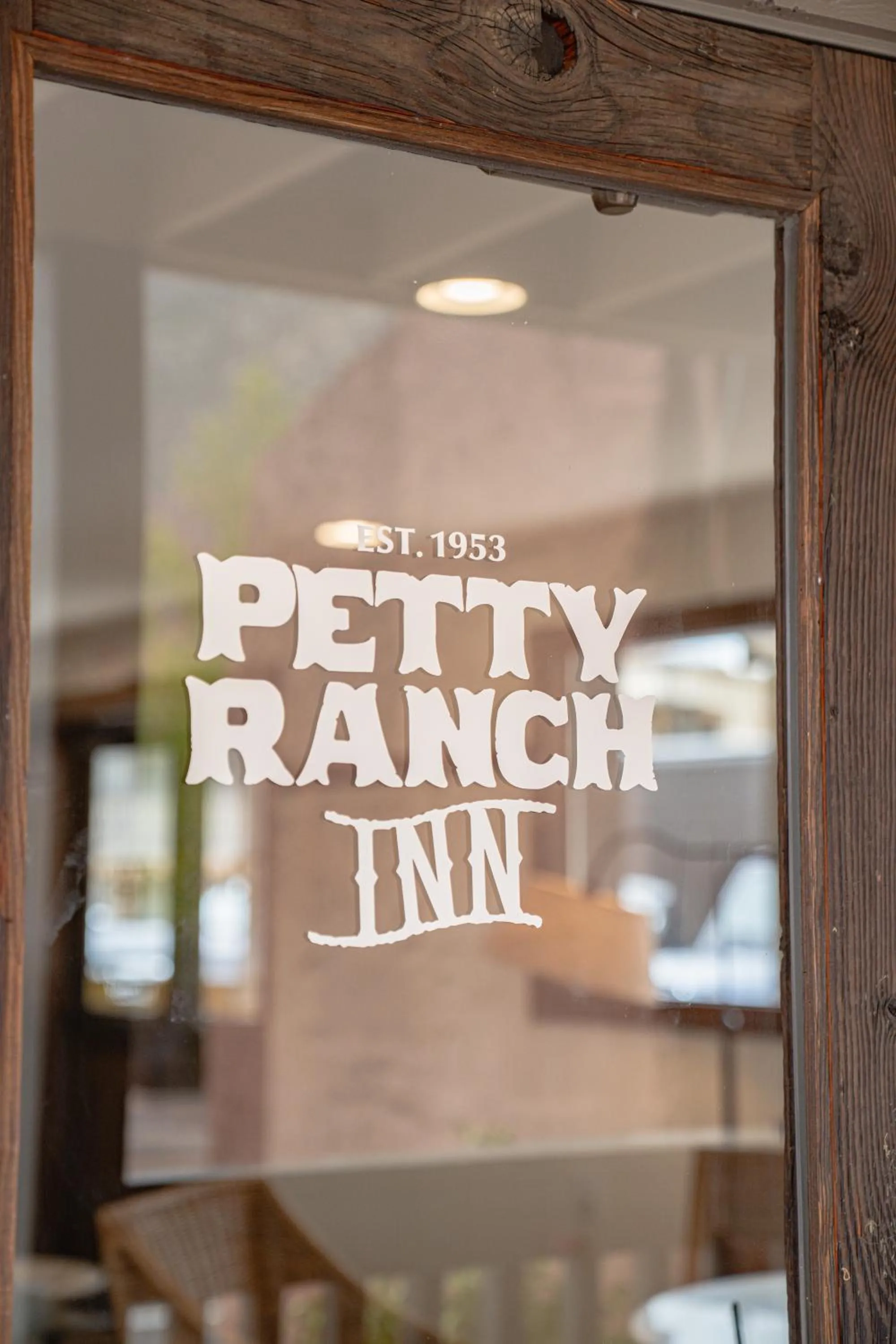 Property logo or sign in Petty Ranch Inn