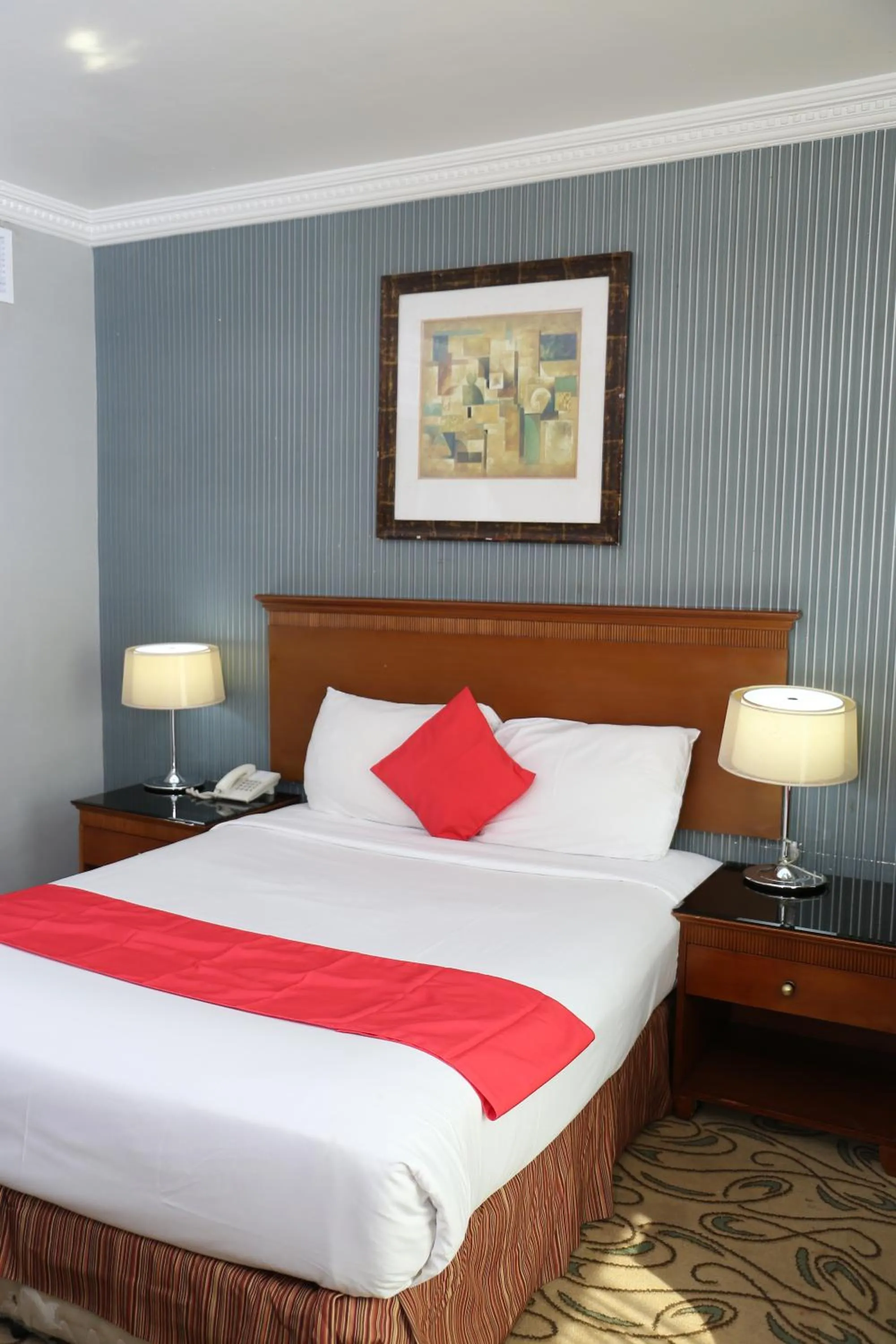 Bed in City Plaza Hotel