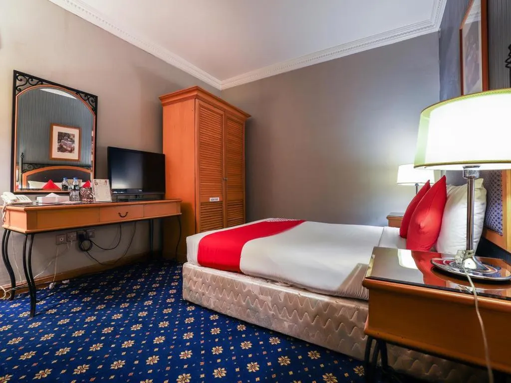 Bed in City Plaza Hotel