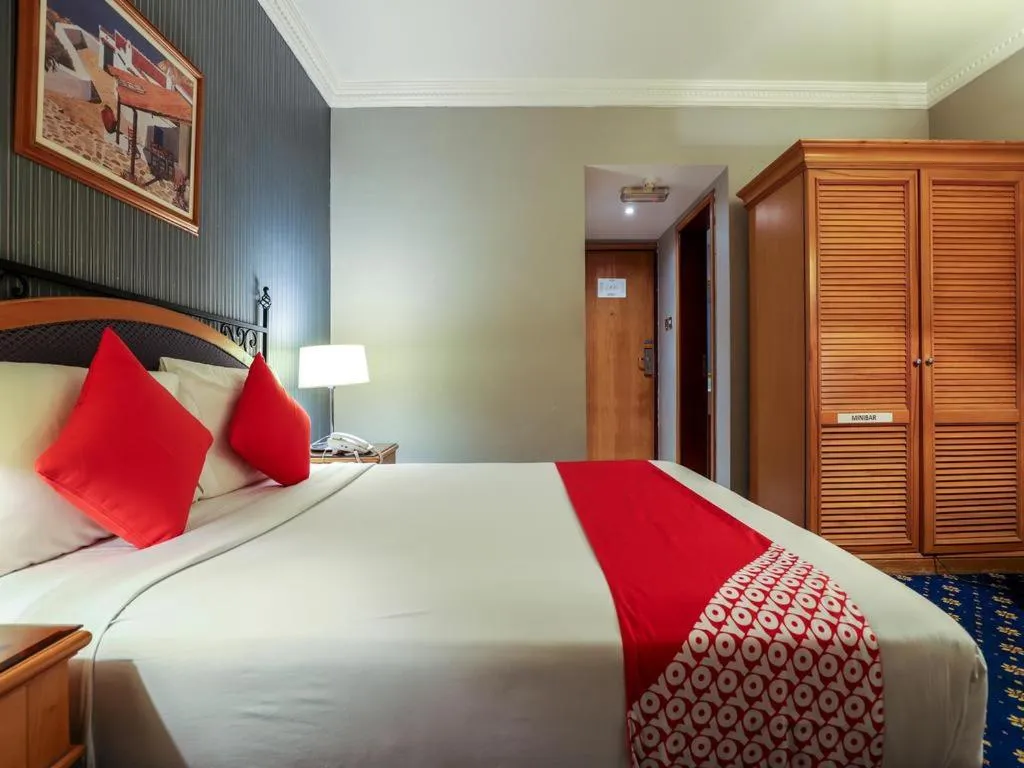 Bed in City Plaza Hotel