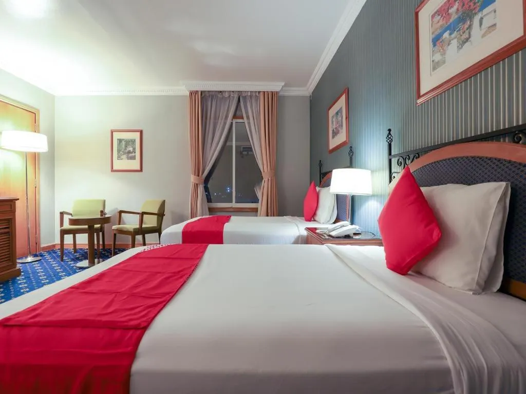 Photo of the whole room, Bed in City Plaza Hotel