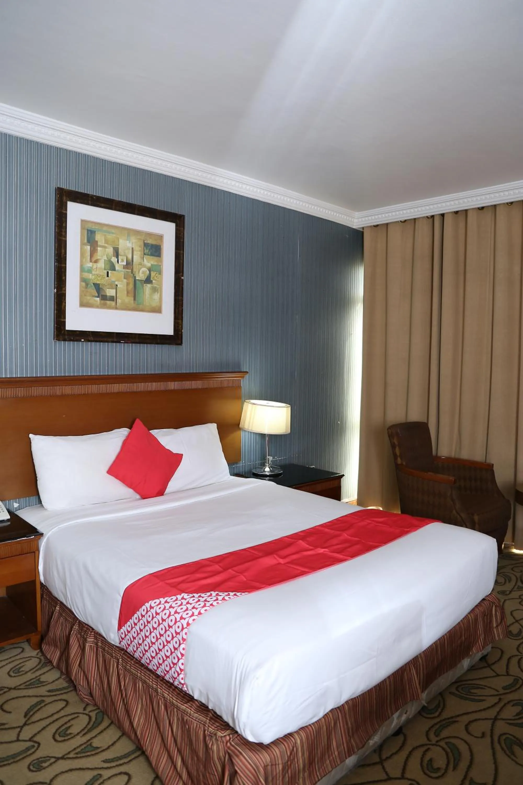 Bed in City Plaza Hotel