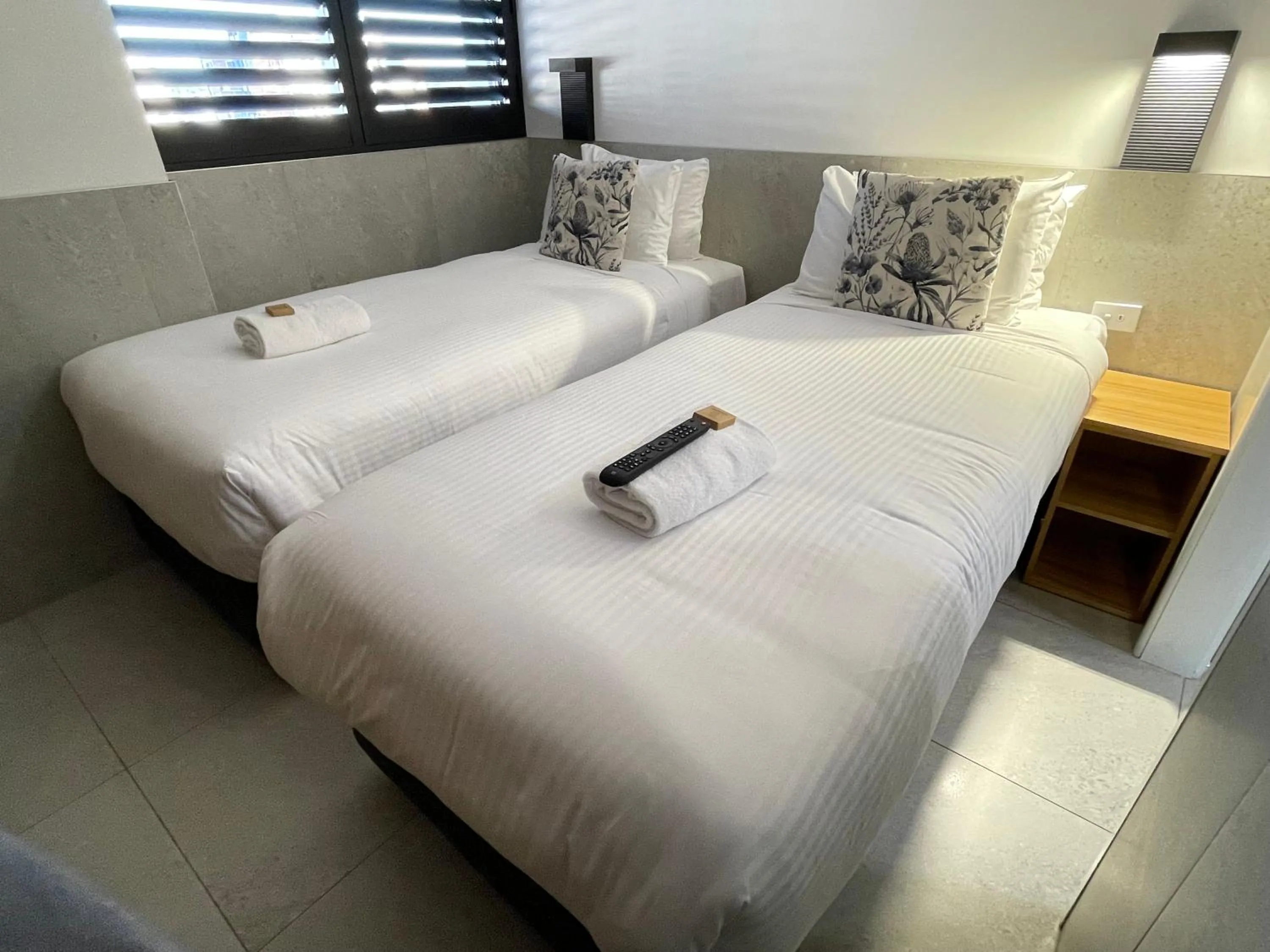 Bed in Honeysuckle Executive Apartments