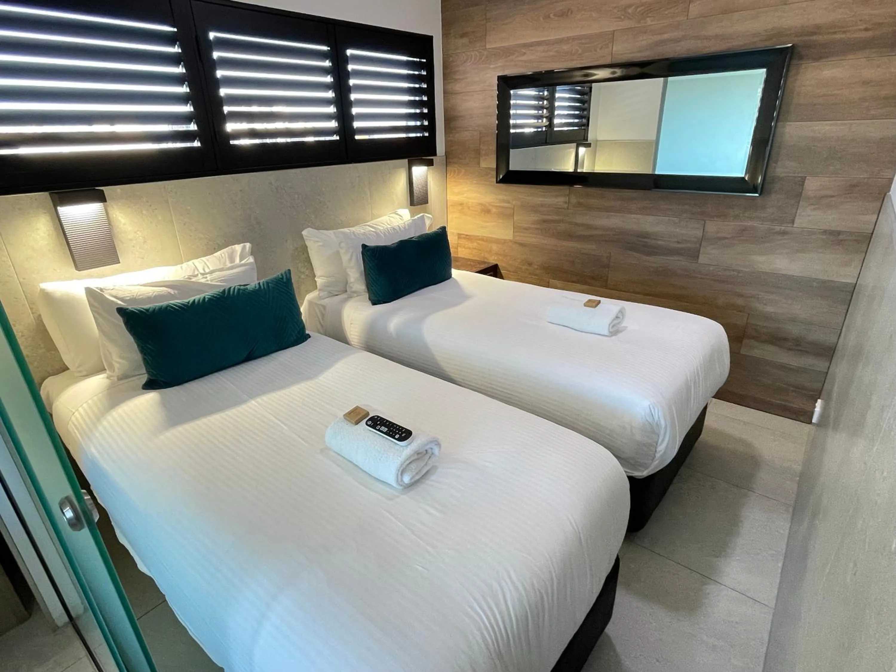 Bed in Honeysuckle Executive Apartments