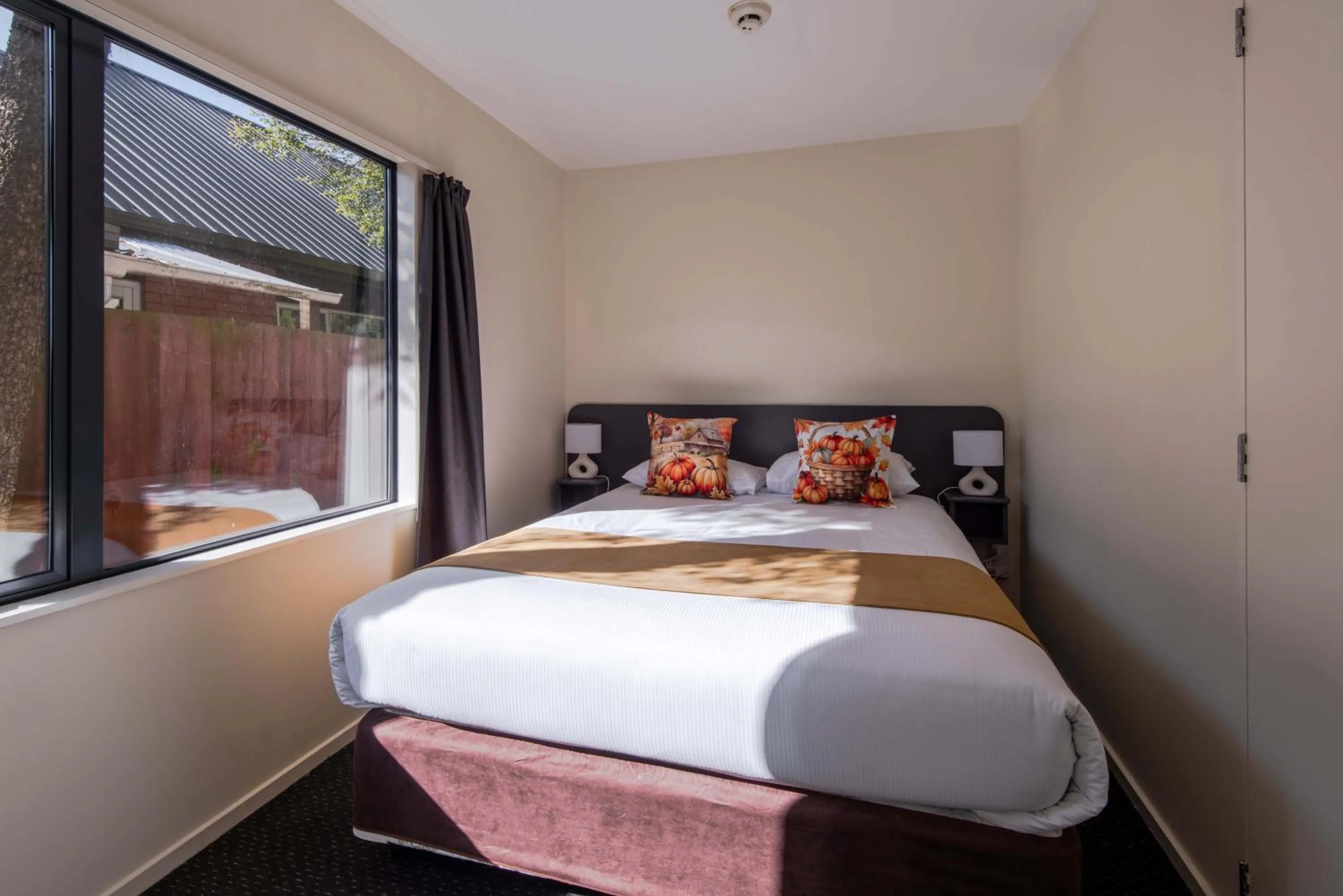 Bed in 298 Westside Motor Lodge