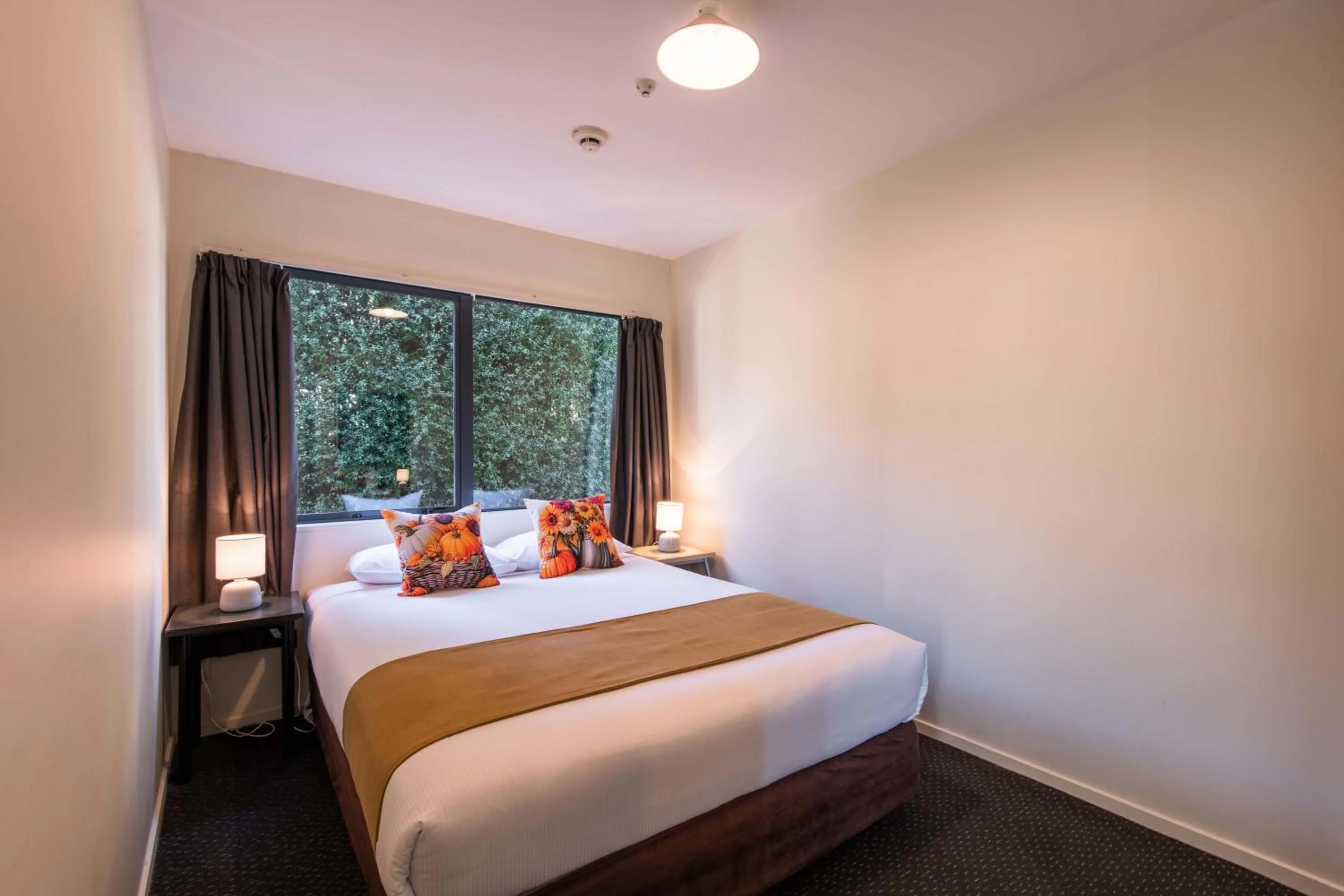 Bed in 298 Westside Motor Lodge