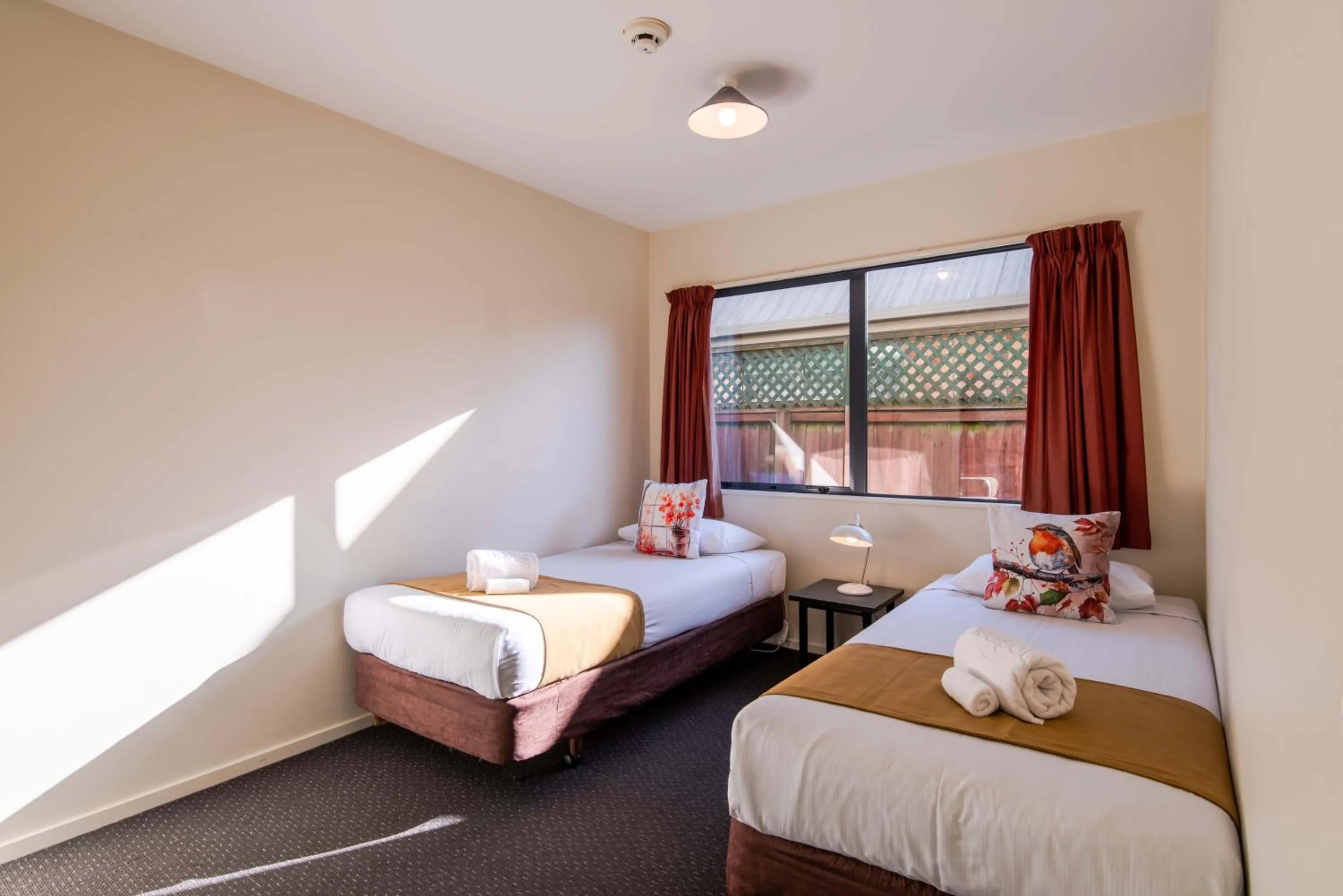 Bed in 298 Westside Motor Lodge