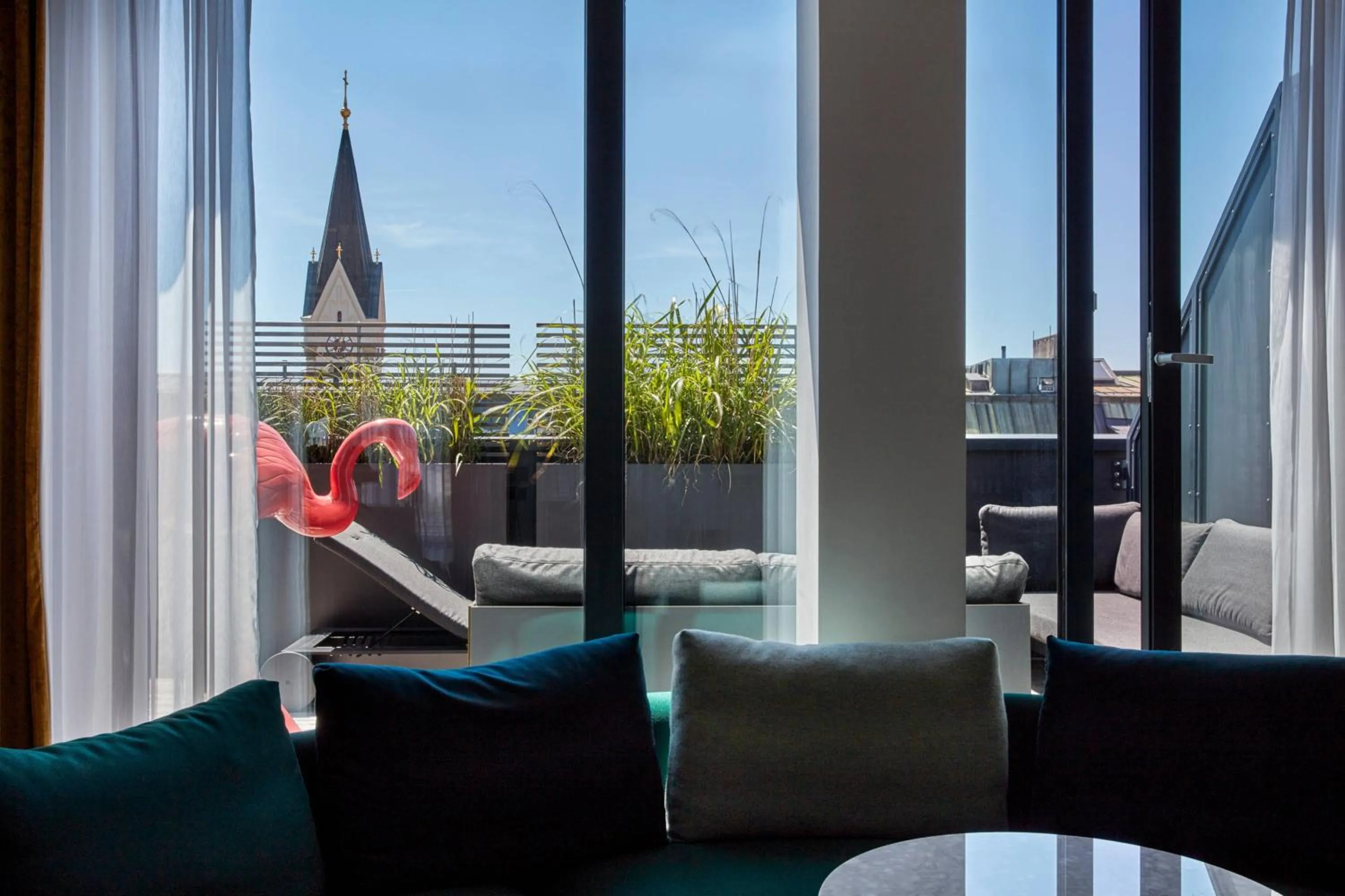 Bedroom in Roomers Munich, Autograph Collection