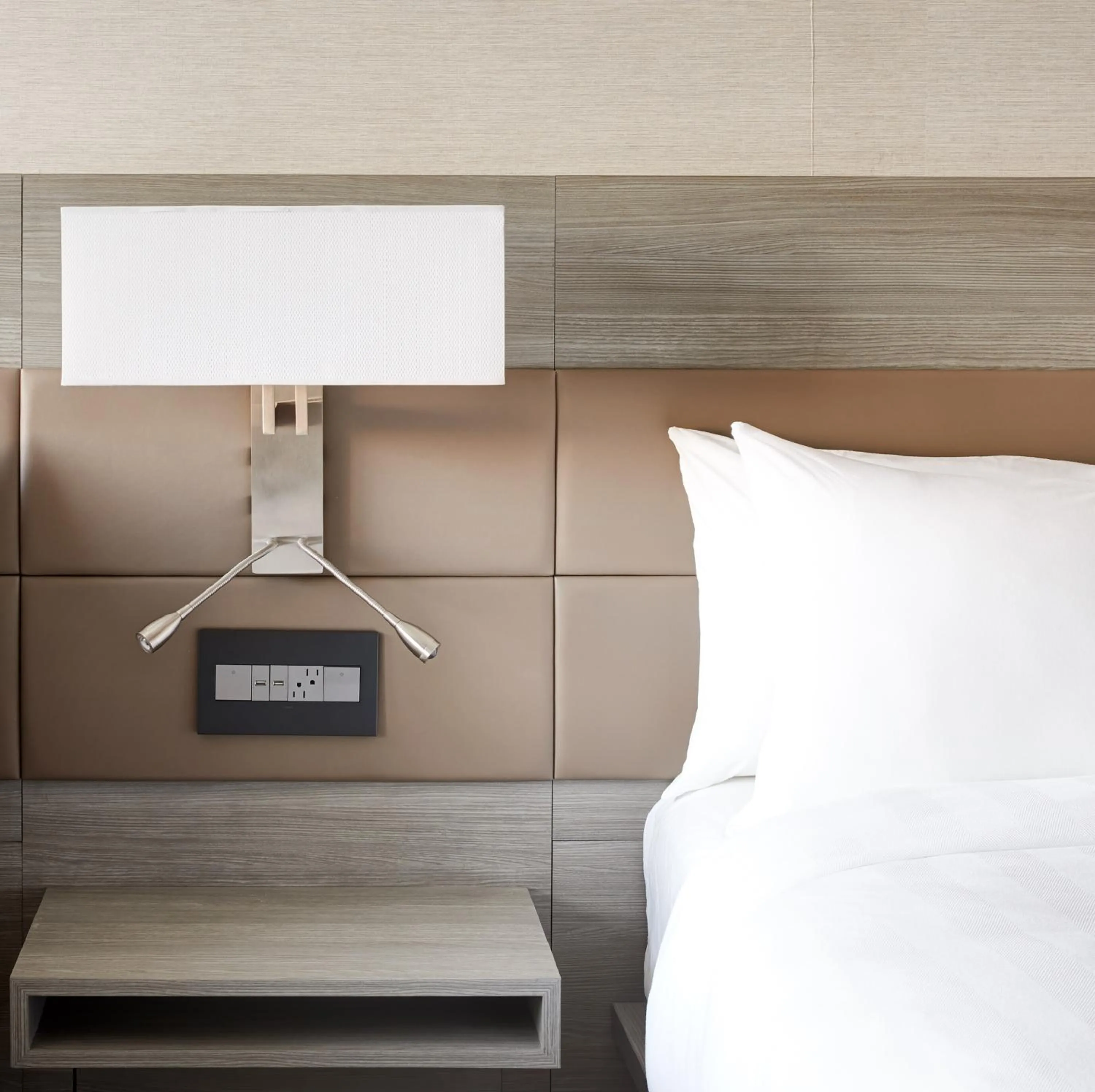 Bed in AC Hotel by Marriott Oklahoma City Bricktown