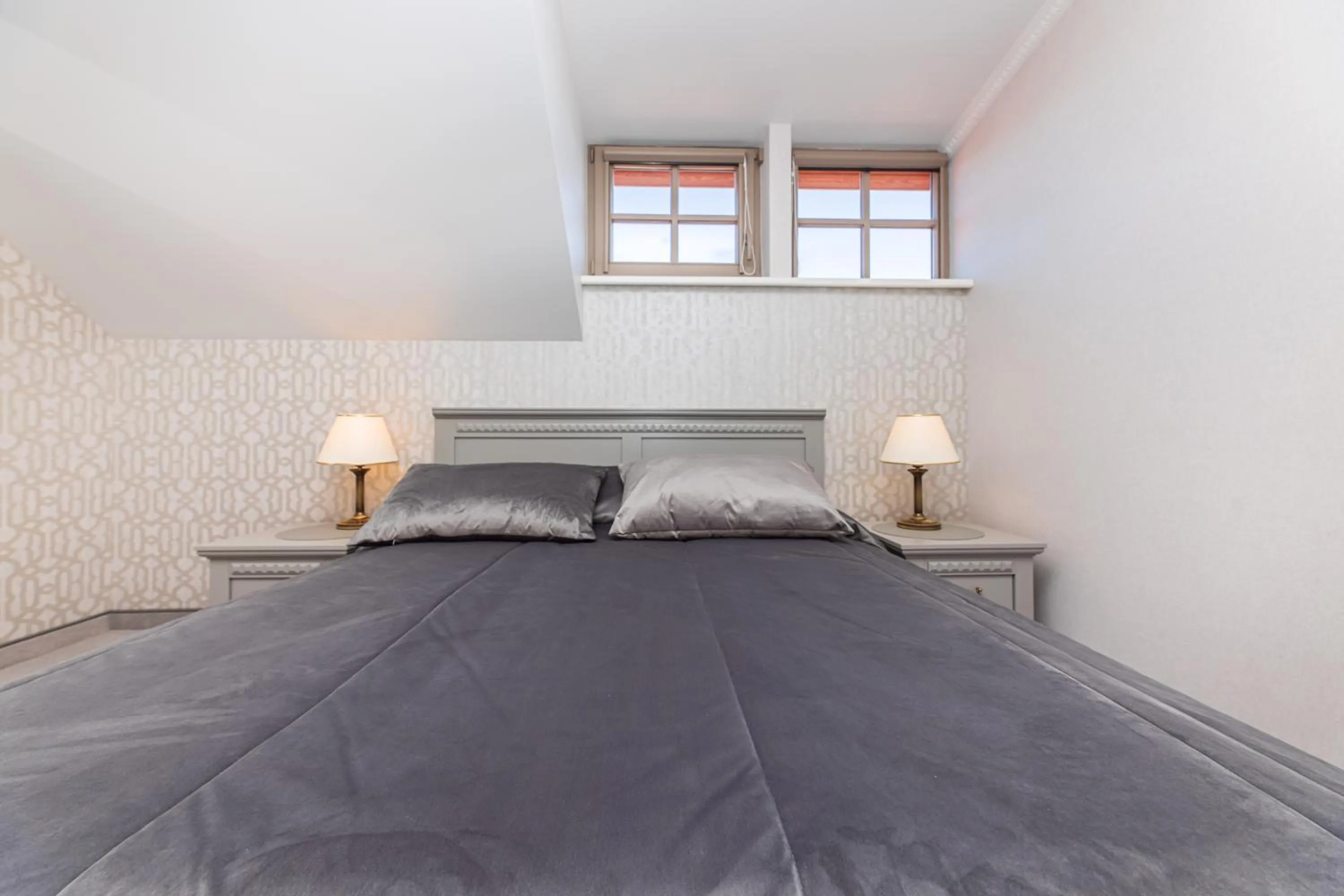 Bed in Senoji Hansa Hotel