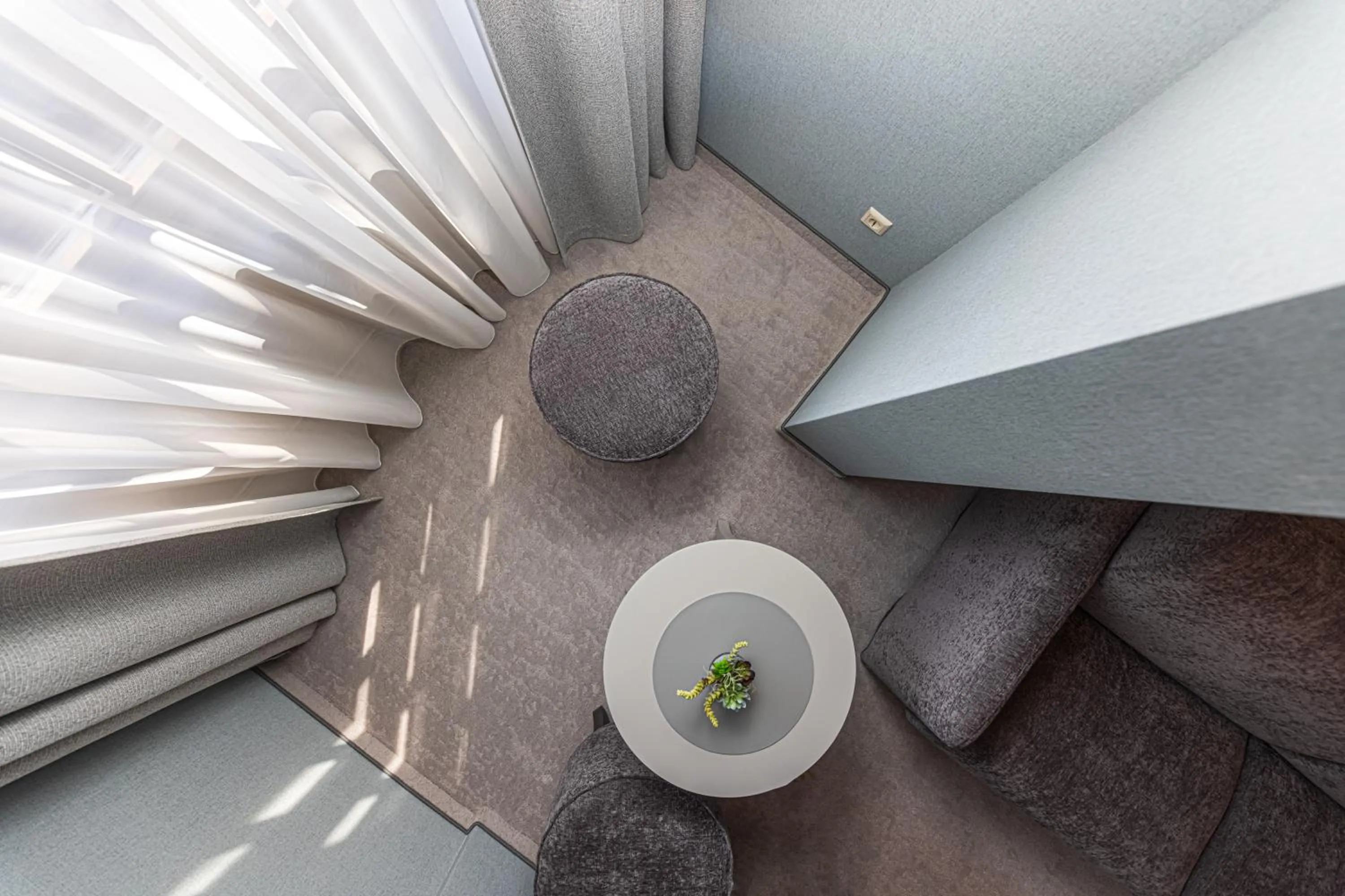 Seating area in Senoji Hansa Hotel