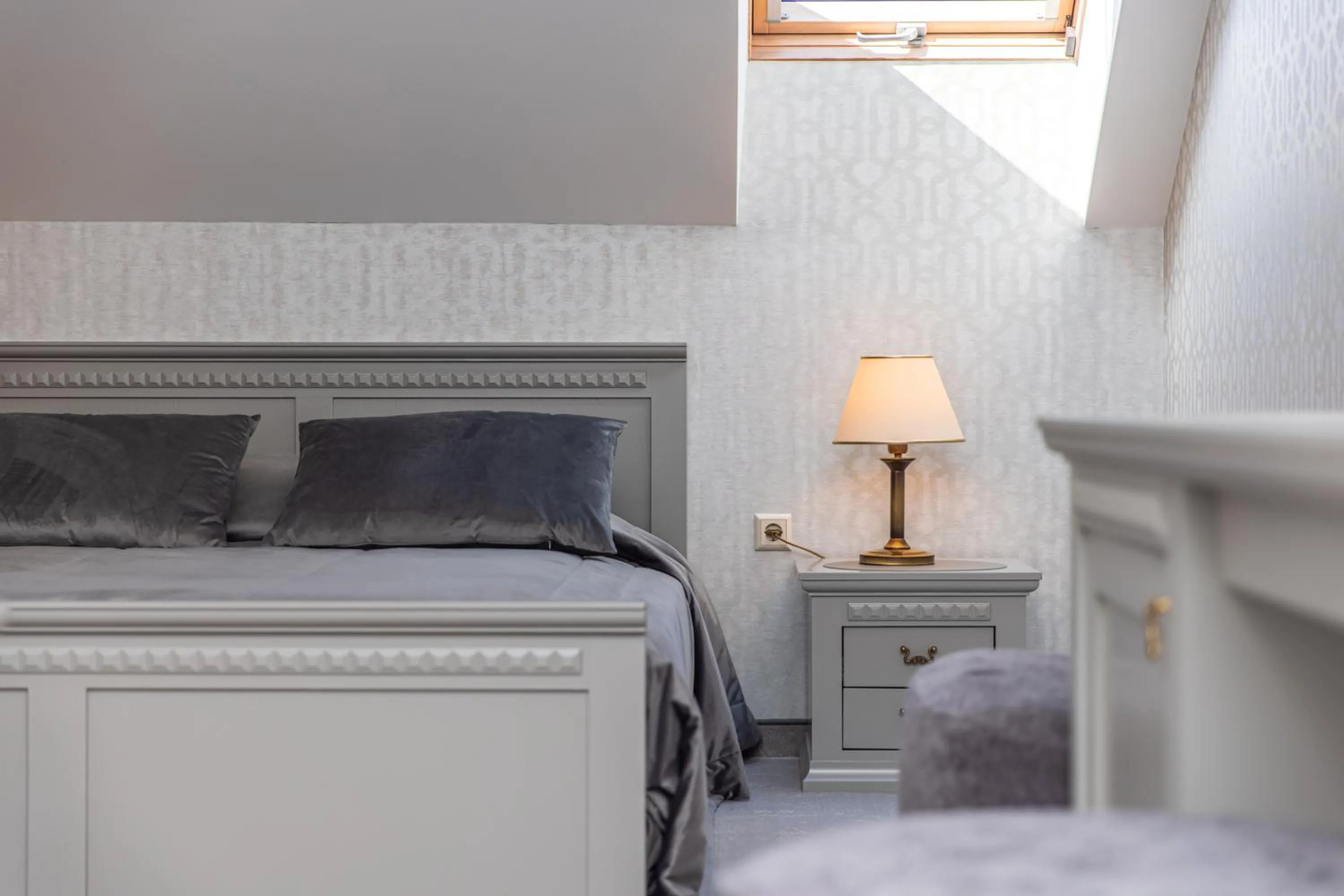 Bed in Senoji Hansa Hotel