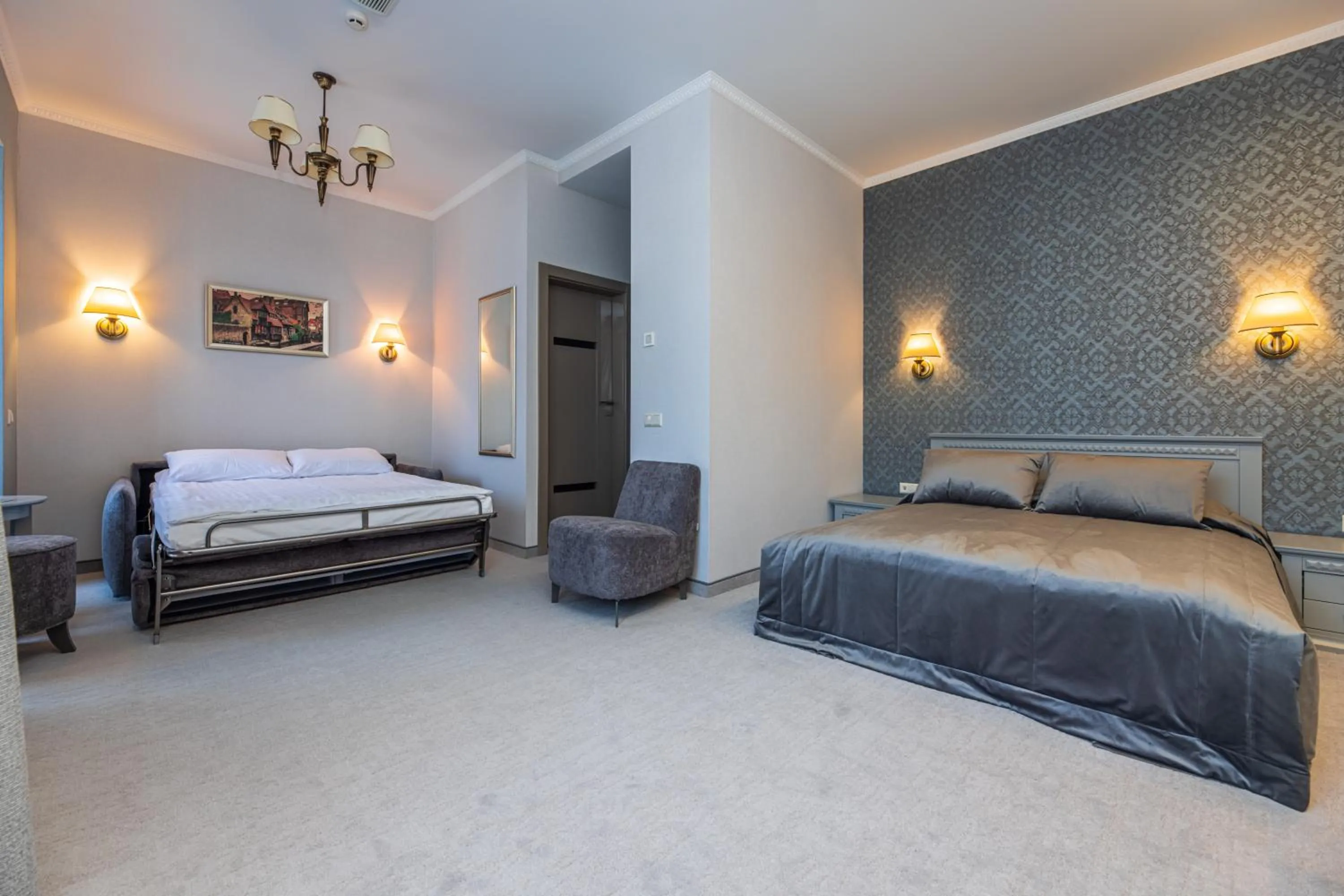 Bed in Senoji Hansa Hotel