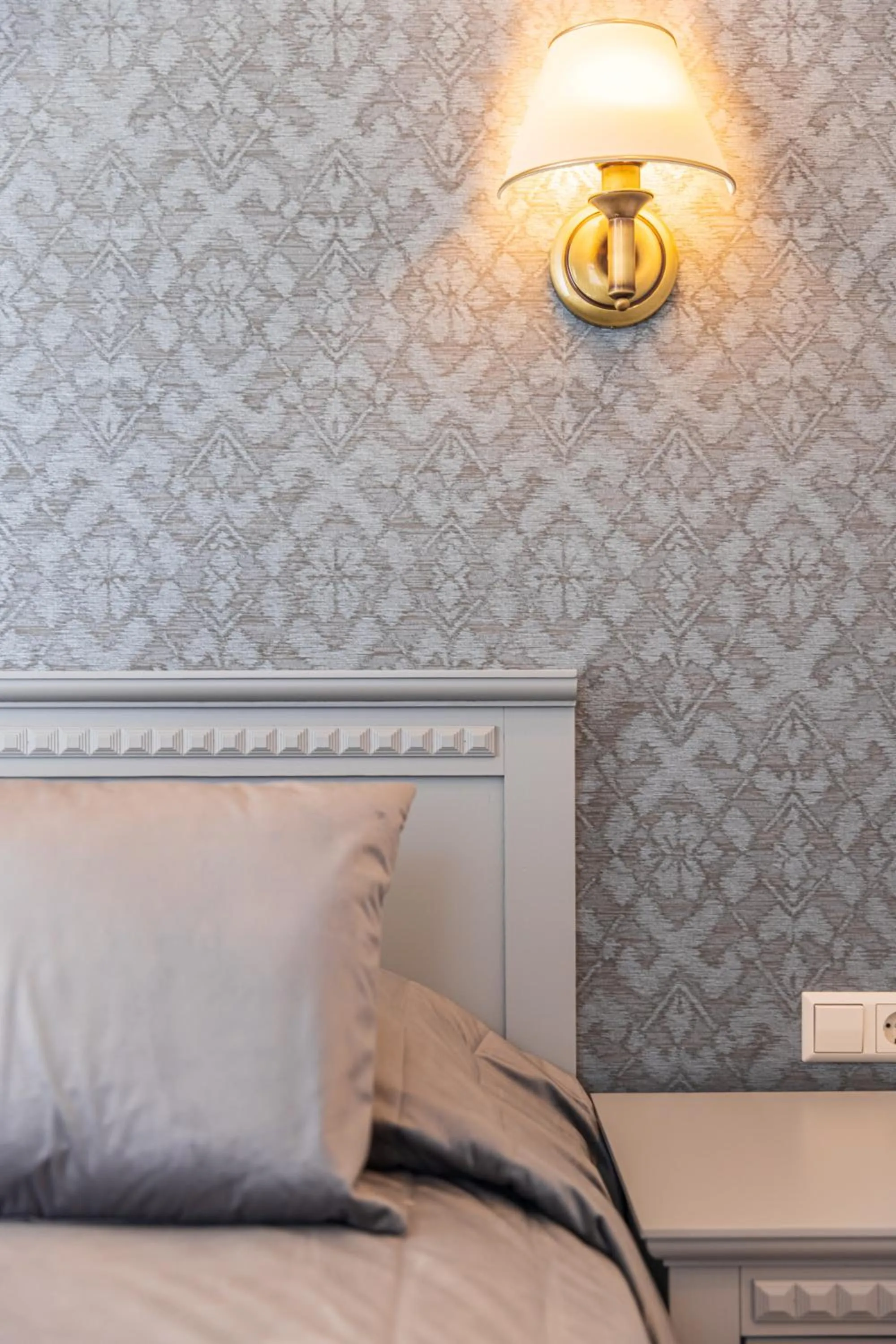 Bed in Senoji Hansa Hotel