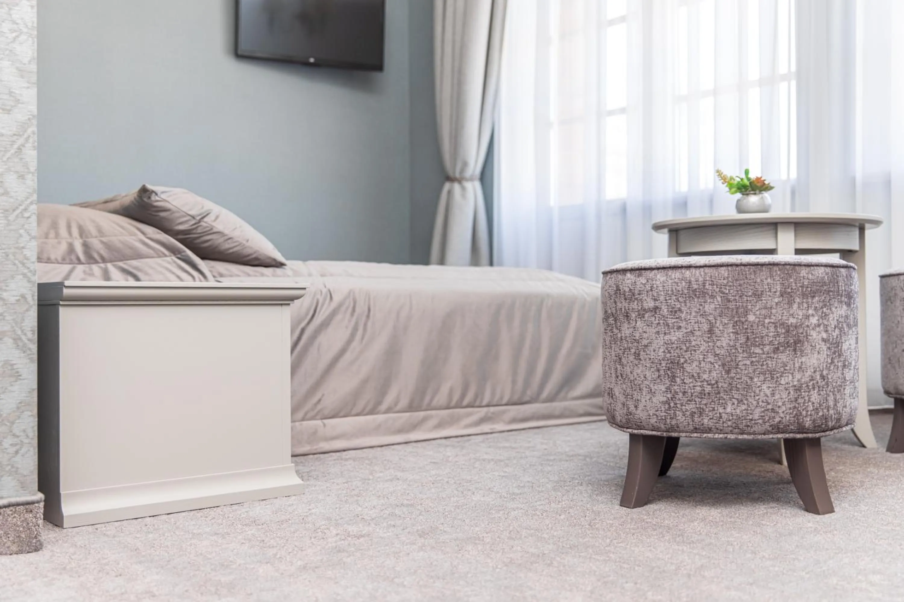 Bed in Senoji Hansa Hotel