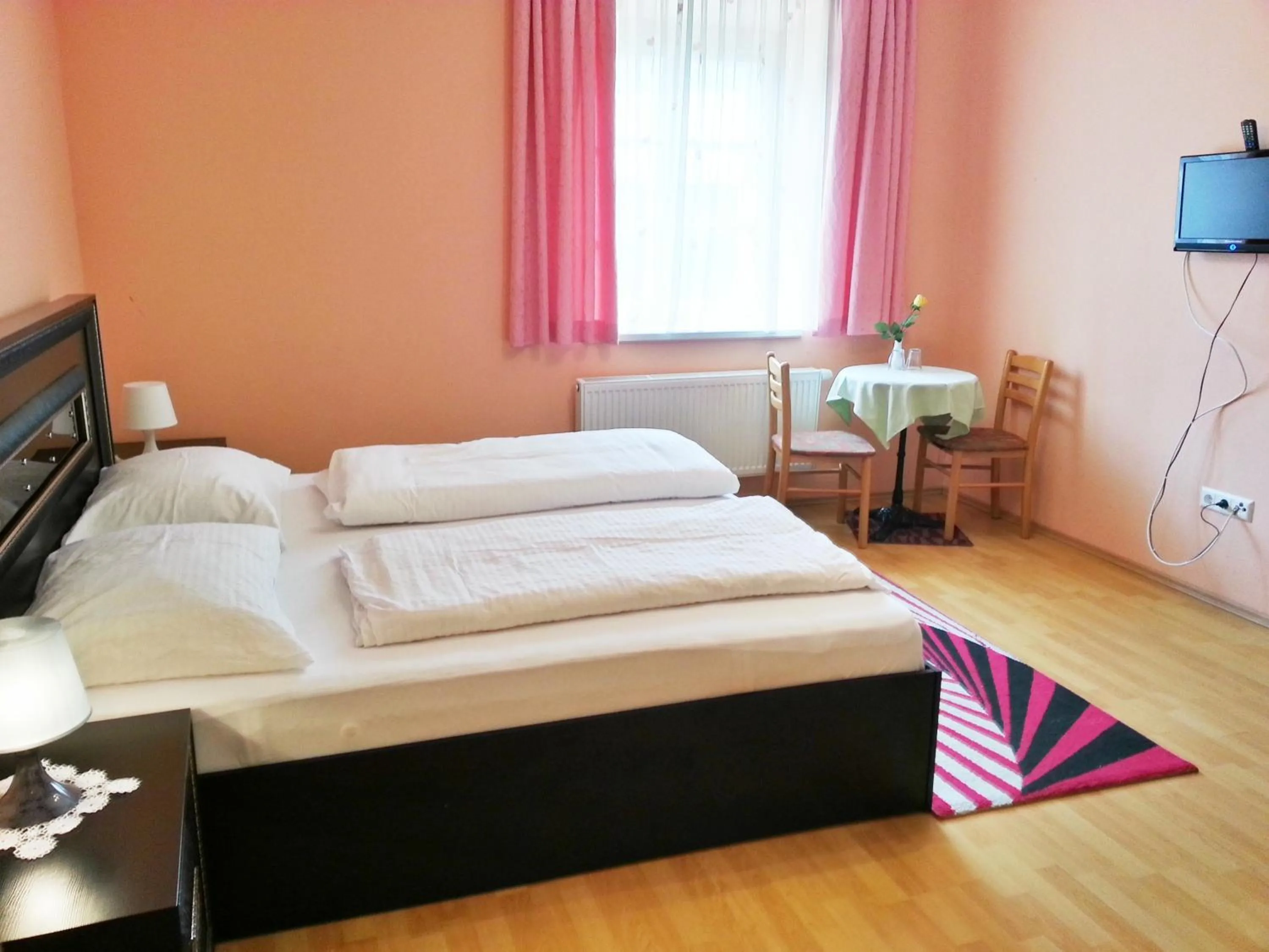 Bed in Pension Weisses Lamm