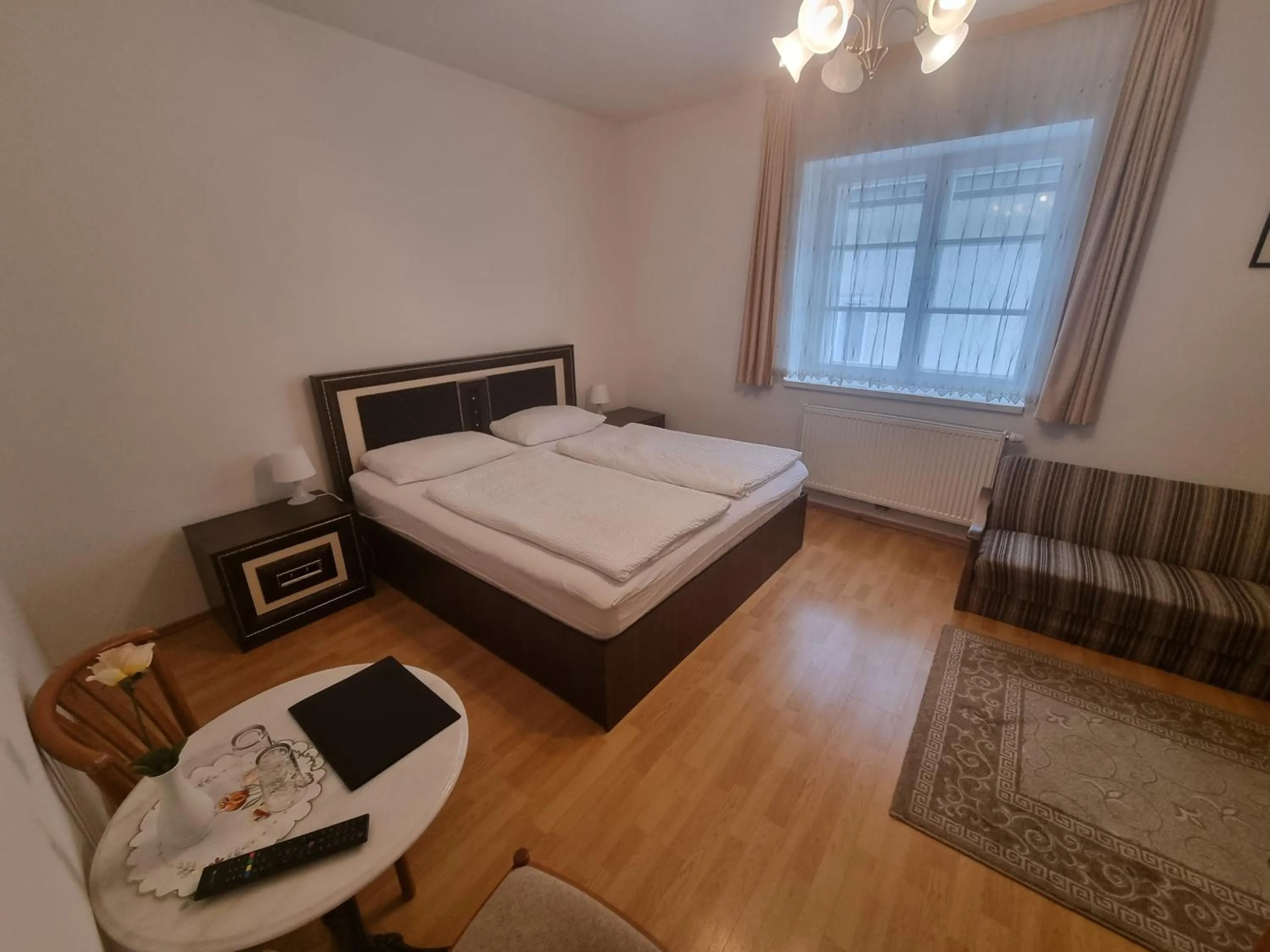 Bed in Pension Weisses Lamm