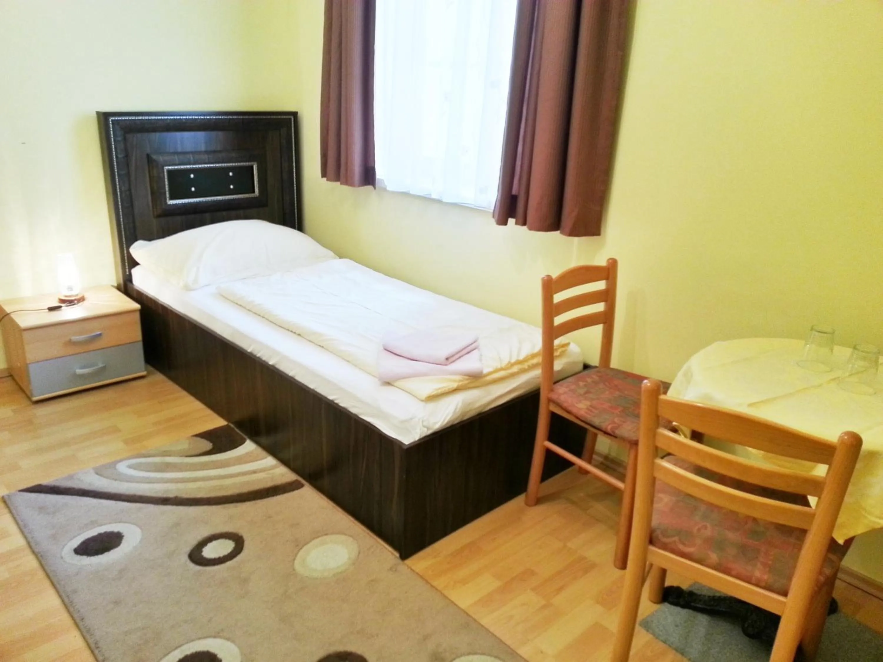 Bed in Pension Weisses Lamm