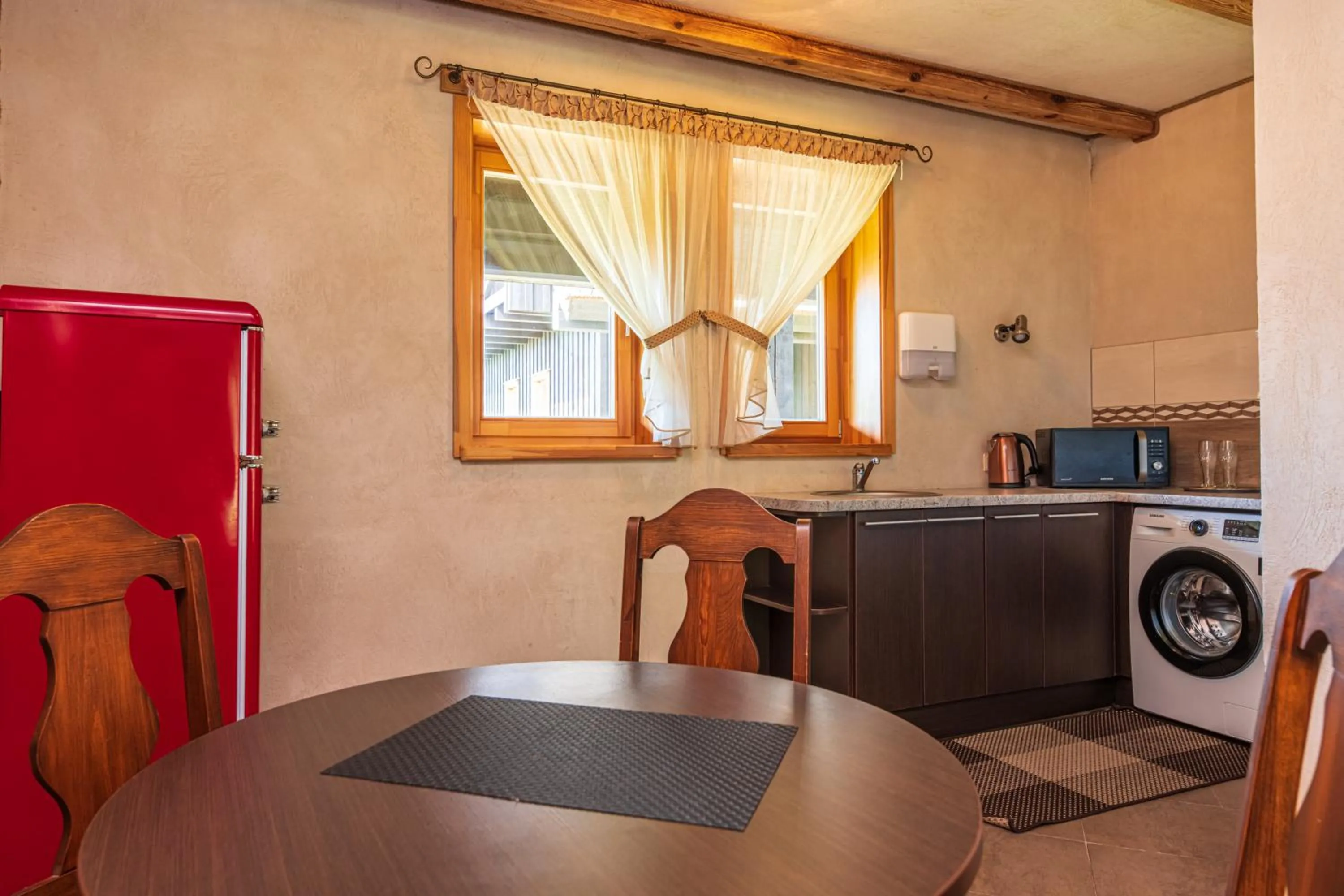 Kitchen or kitchenette in Pajūrio Sodyba