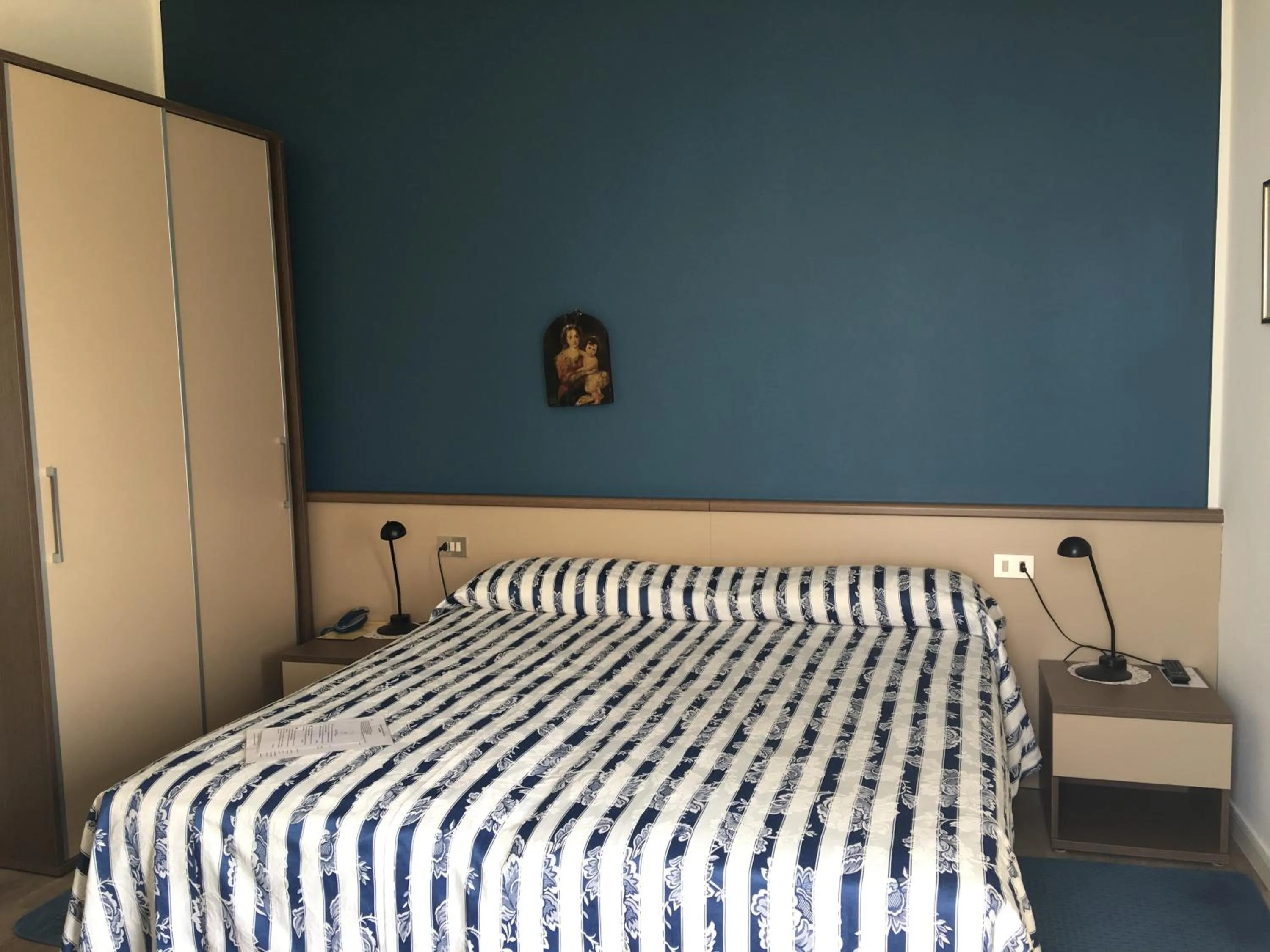 Bed in Belvedere Hotel & Villa