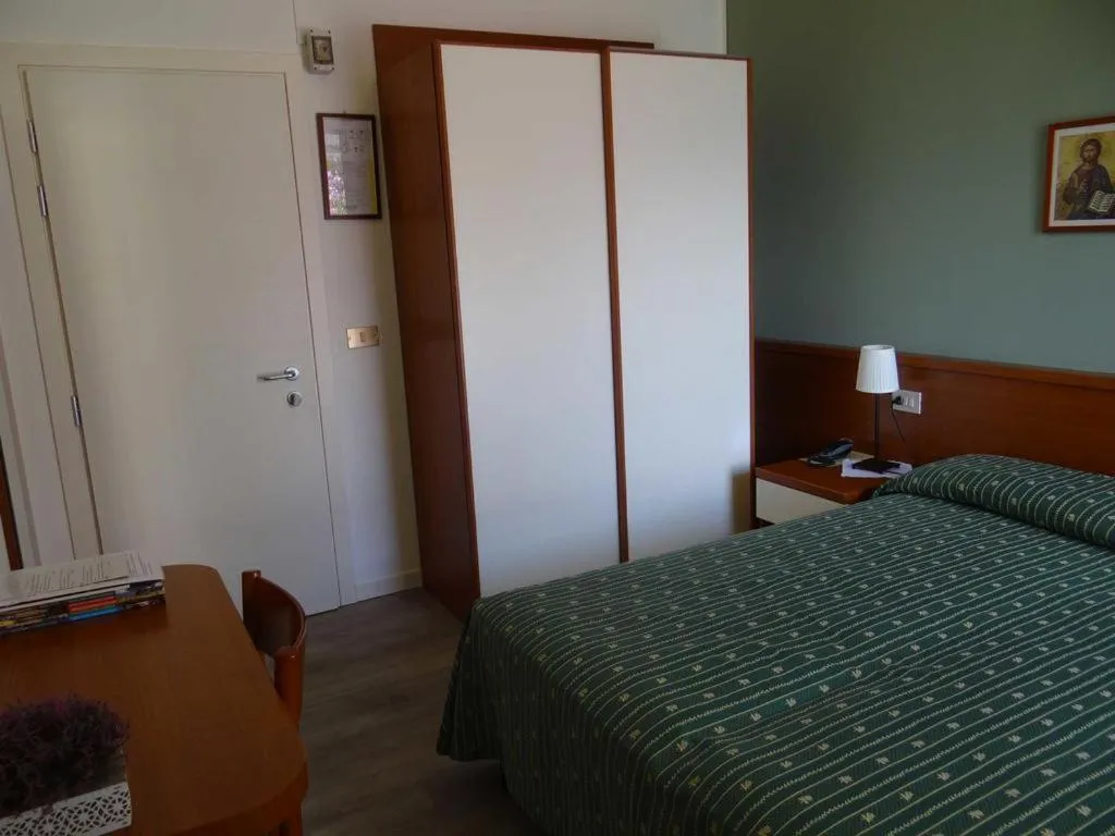 Bed in Belvedere Hotel & Villa