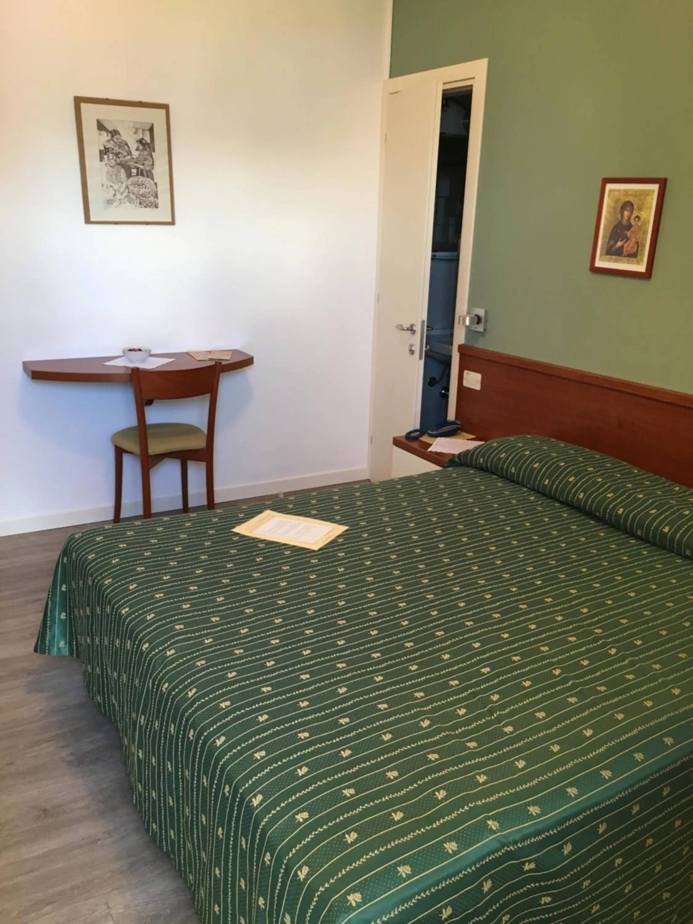 Bed in Belvedere Hotel & Villa