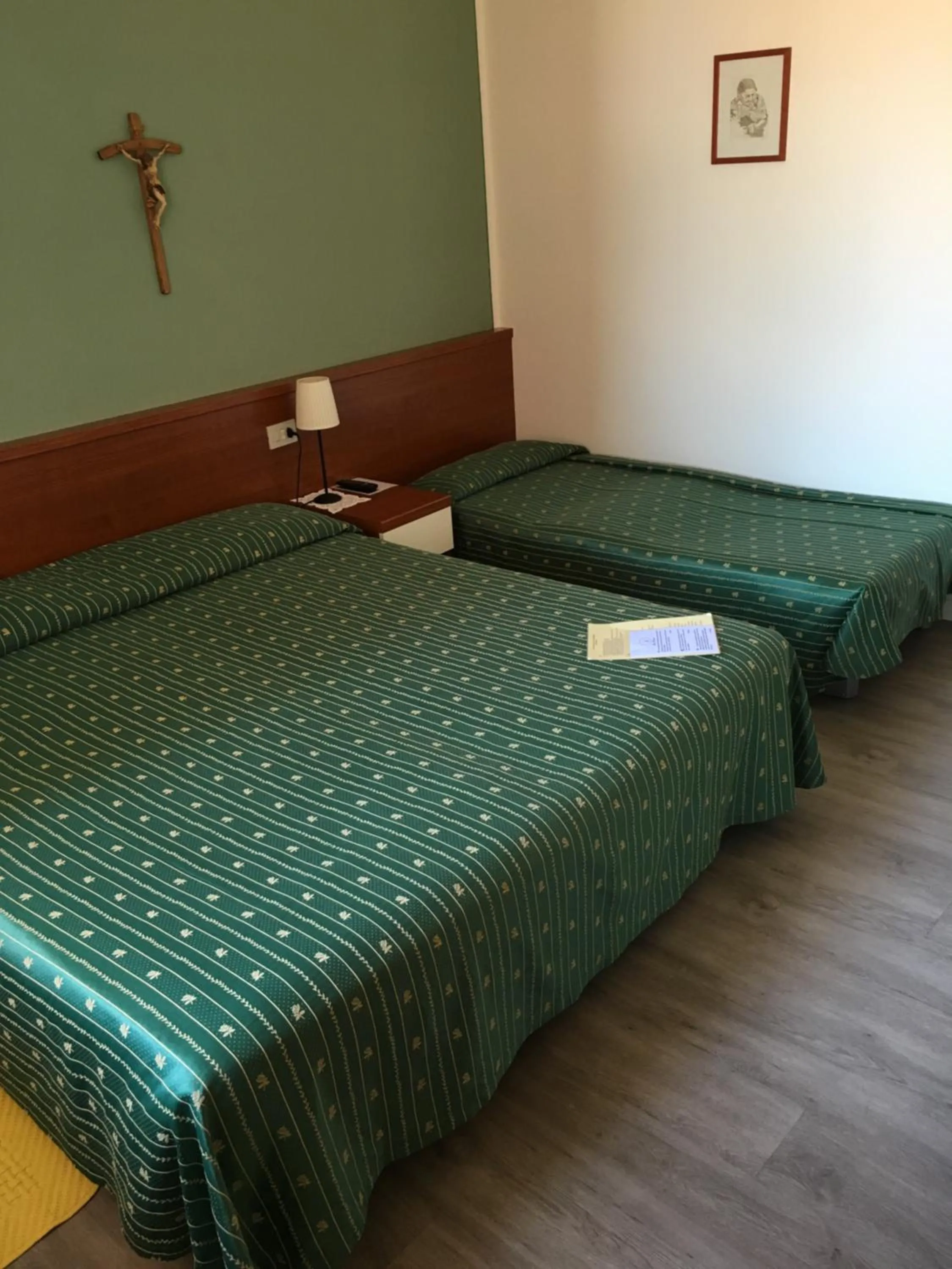 Bed in Belvedere Hotel & Villa