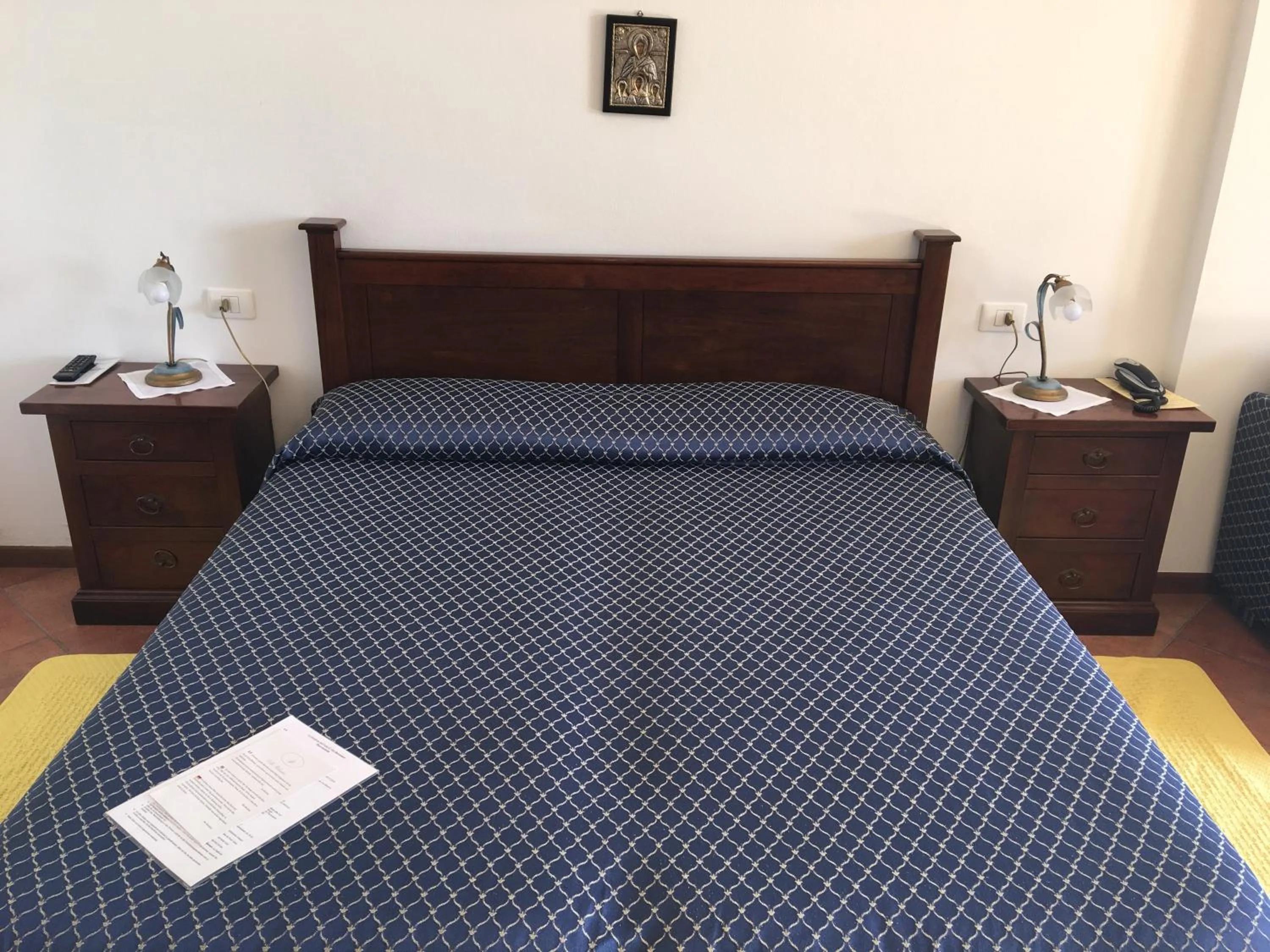 Bed in Belvedere Hotel & Villa