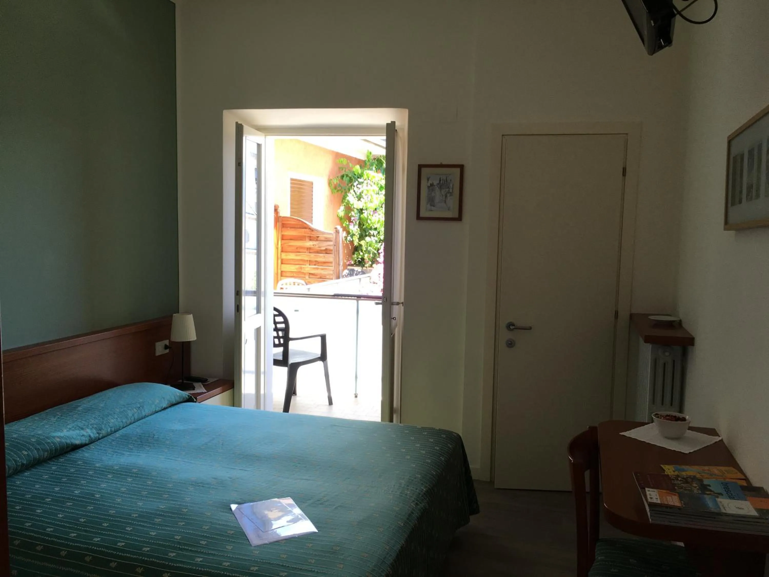 Bed in Belvedere Hotel & Villa