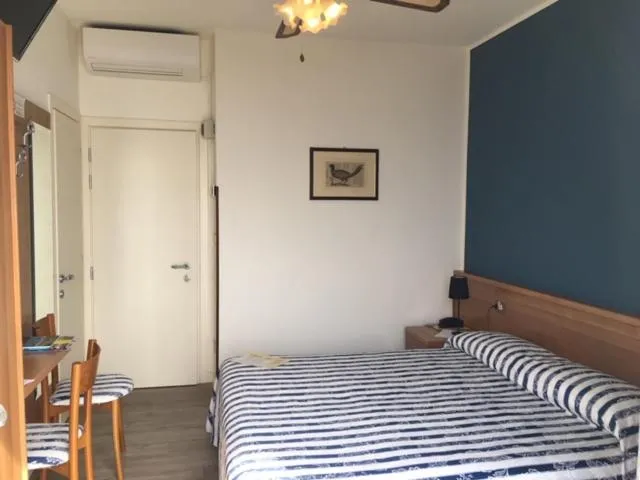 Bed in Belvedere Hotel & Villa