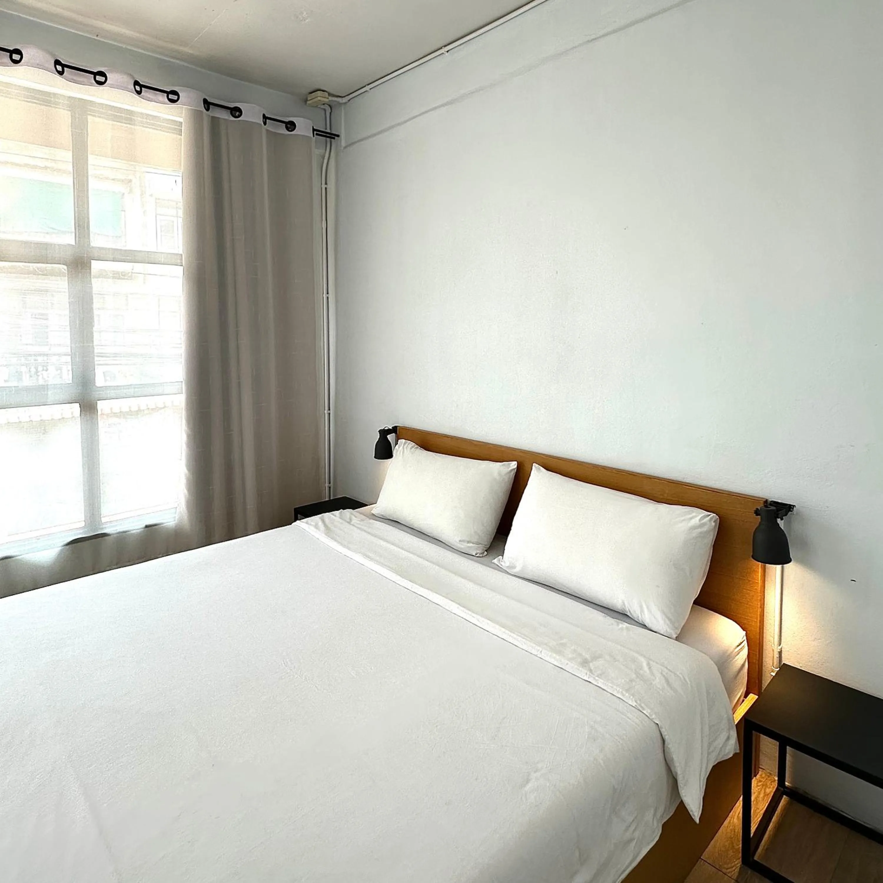 Bed in Beige Poshtels + Netflix