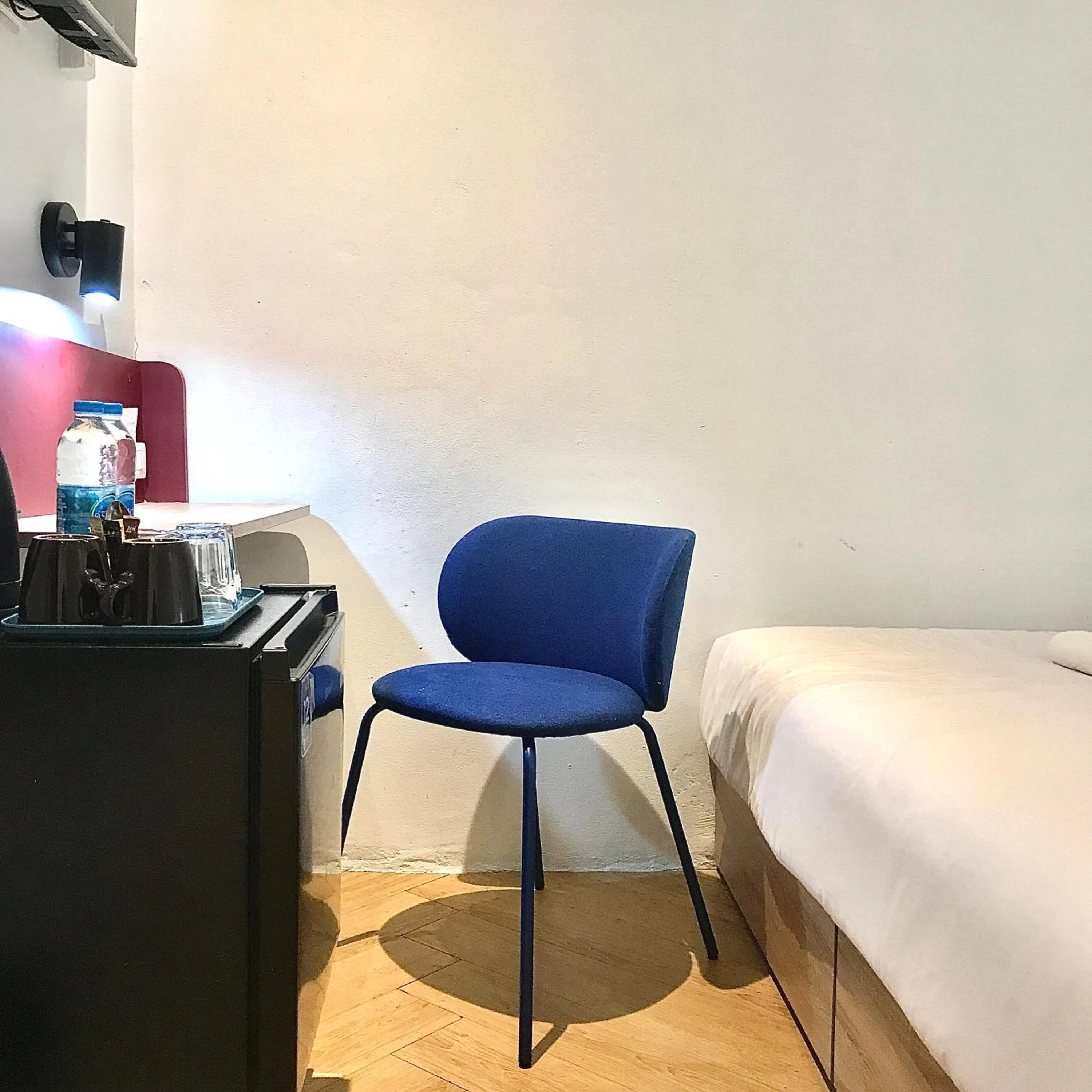 Bed in Beige Poshtels + Netflix