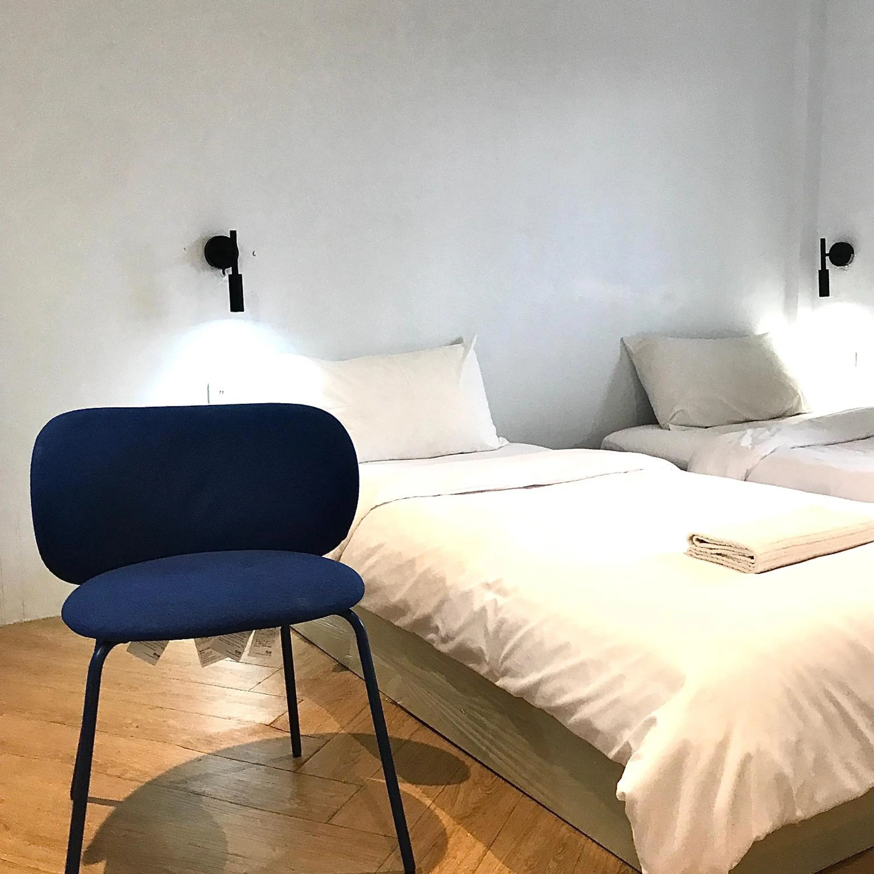 Bed in Beige Poshtels + Netflix