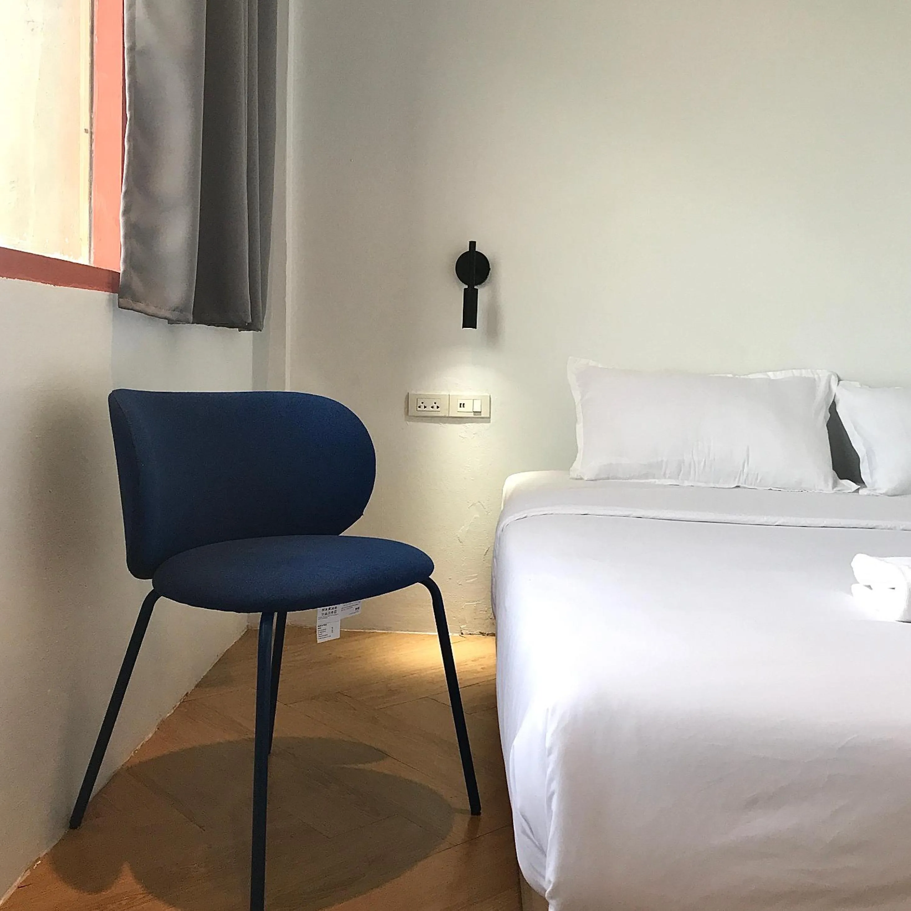 Bed in Beige Poshtels + Netflix