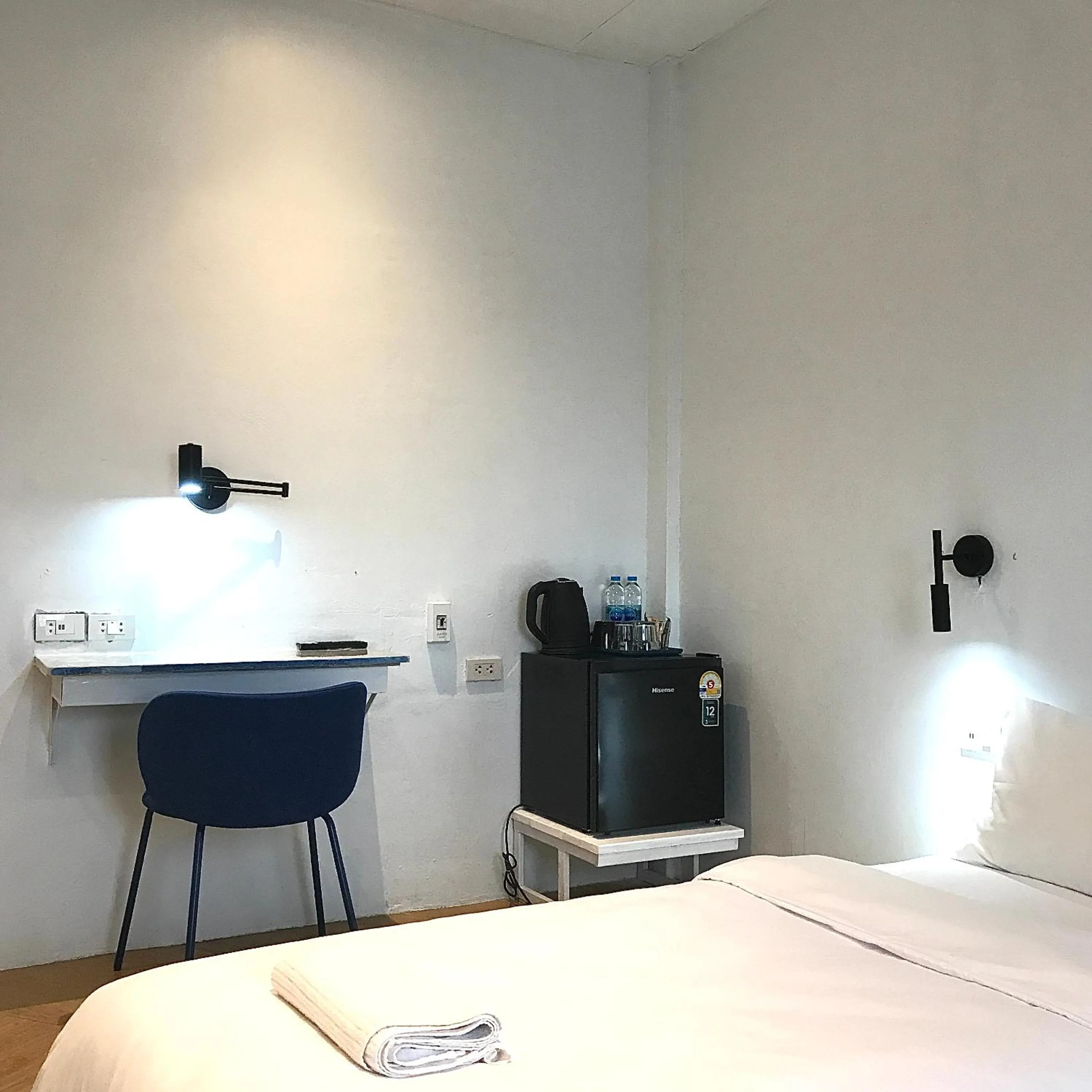 Bed in Beige Poshtels + Netflix