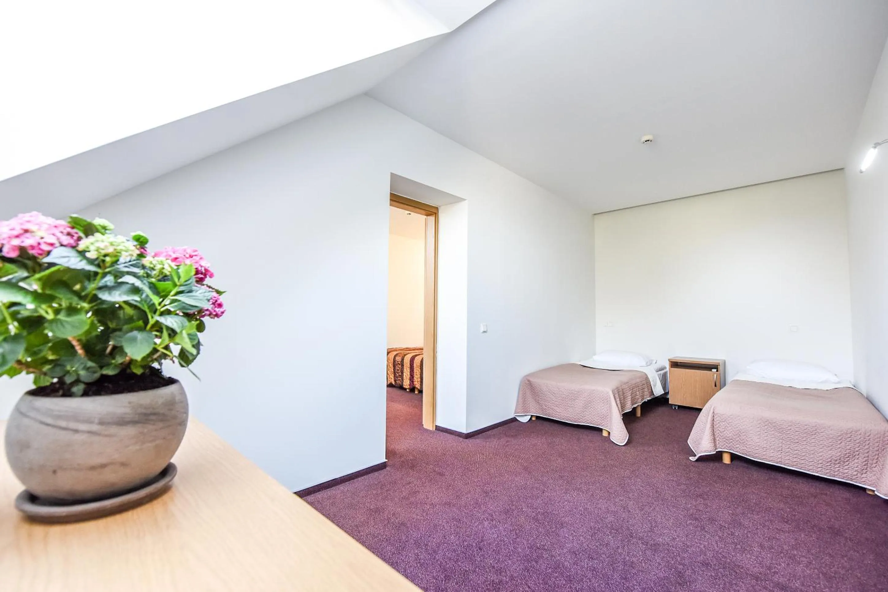 Bedroom in Muza Hotel