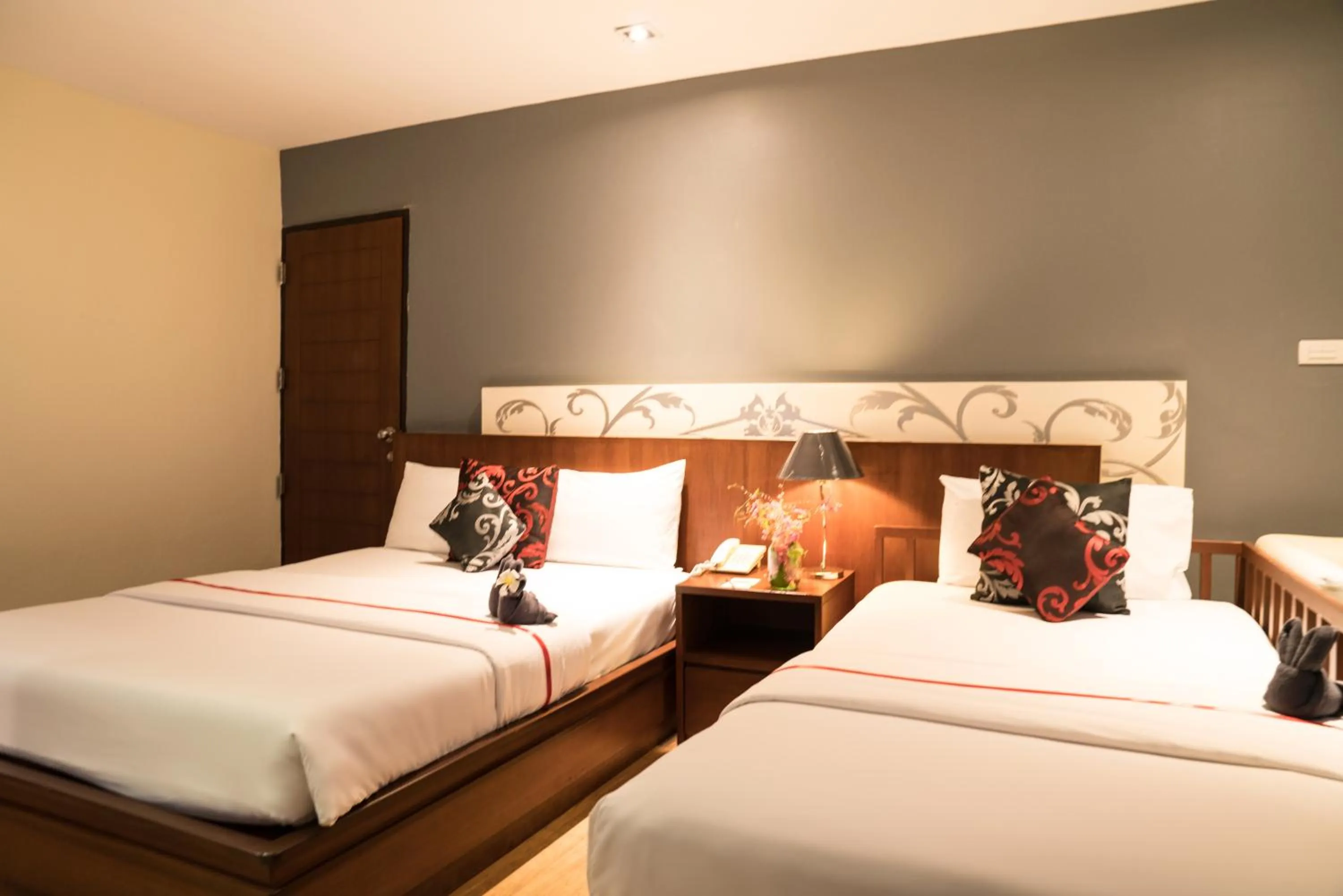 Bed in Grand Jomtien Palace Hotel - SHA Extra Plus