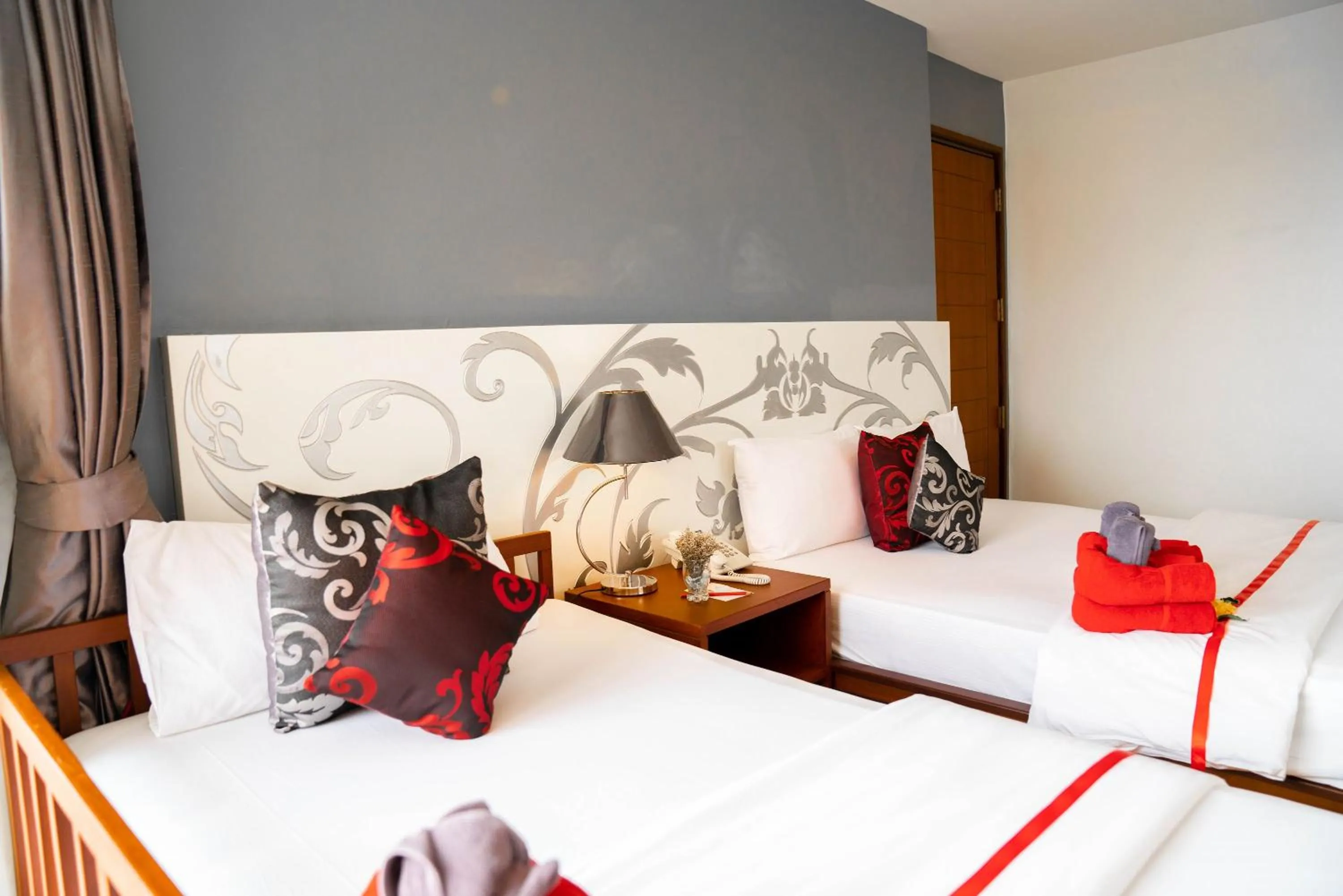 Bed in Grand Jomtien Palace Hotel - SHA Extra Plus