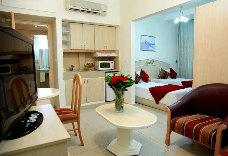 Living room, Bed in Elysee Residence